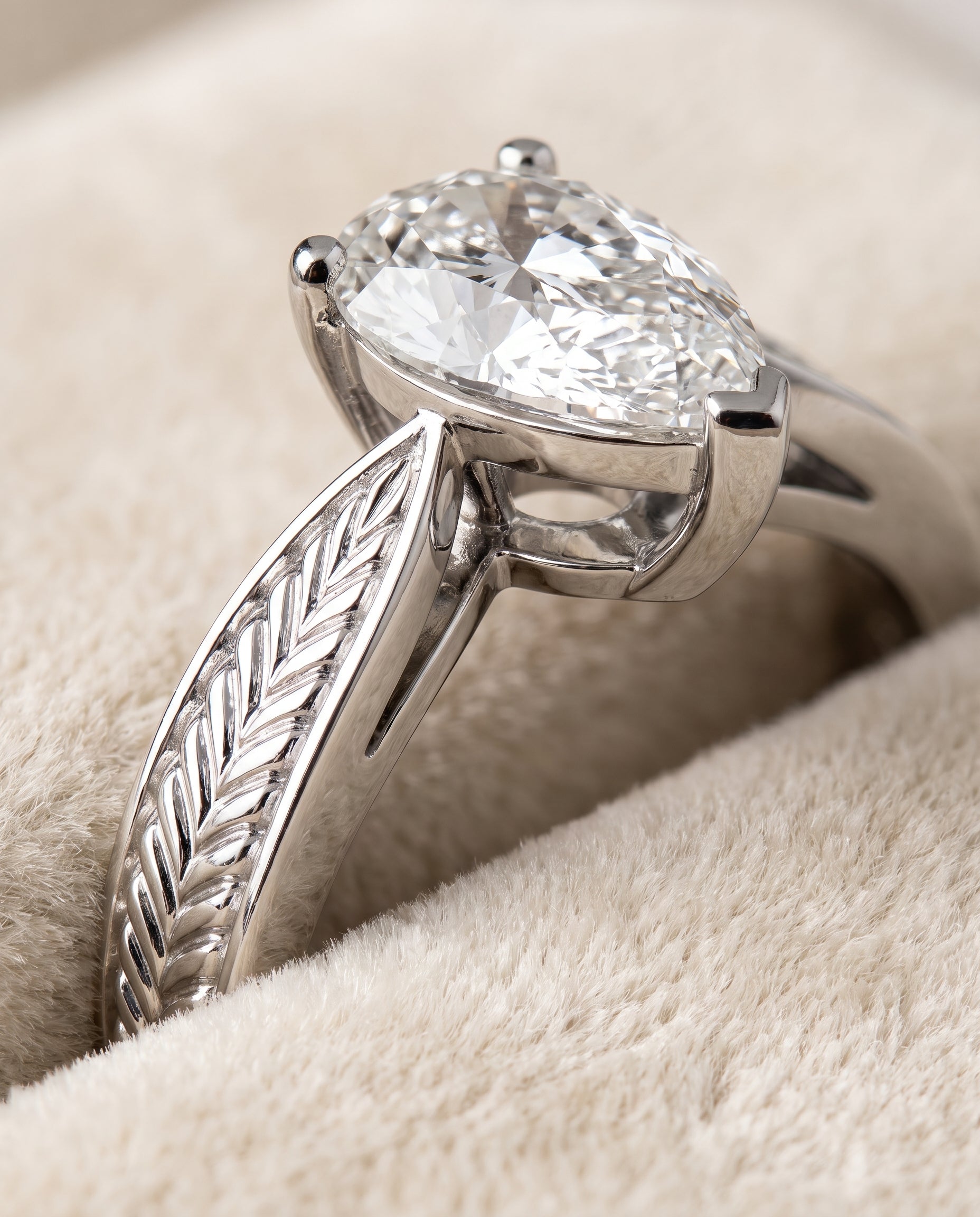 Platinum band of The Roberta pear engagement ring setting | RockHer