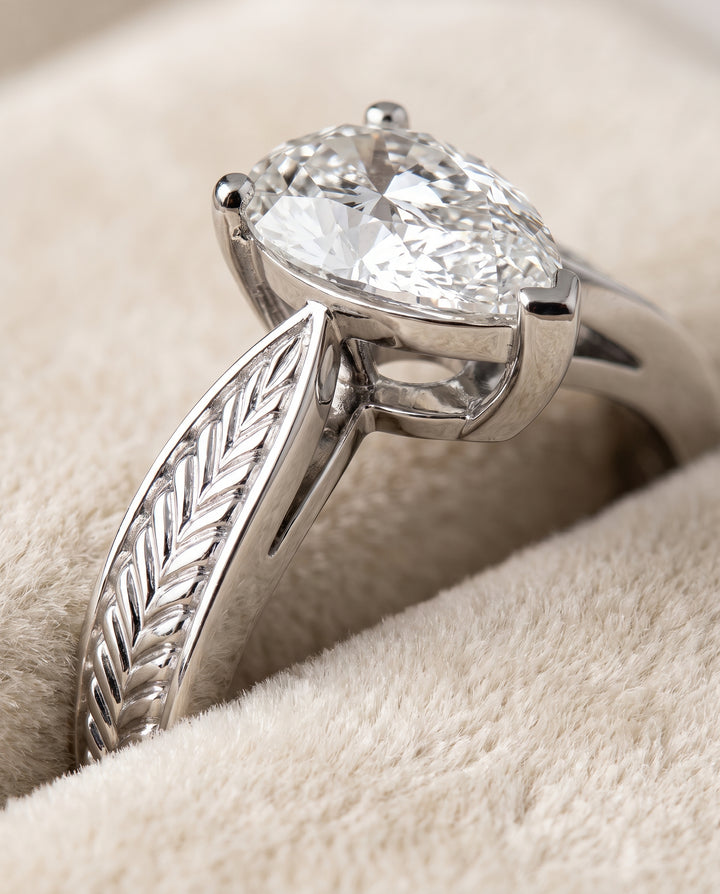The Roberta Vintage Leaf Pattern Solitaire Pear Engagement Ring Setting in Platinum