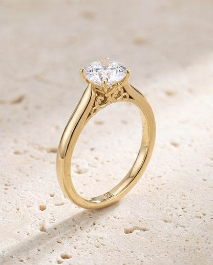 The Rosalie Scroll Gallery Solitaire Round Engagement Ring Setting in 18K Yellow Gold