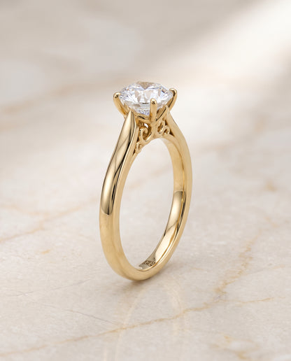 The Rosalie Scroll Gallery Solitaire Round Engagement Ring Setting in 18K Yellow Gold
