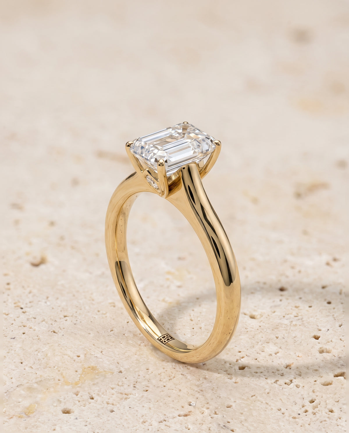 The Rosanna Cathedral Surprise Stone Solitaire Emerald Cut Engagement Ring Setting in 18K Yellow Gold