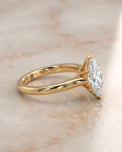 The Rosanna Cathedral Surprise Stone Solitaire Marquise Engagement Ring Setting in 18K Yellow Gold