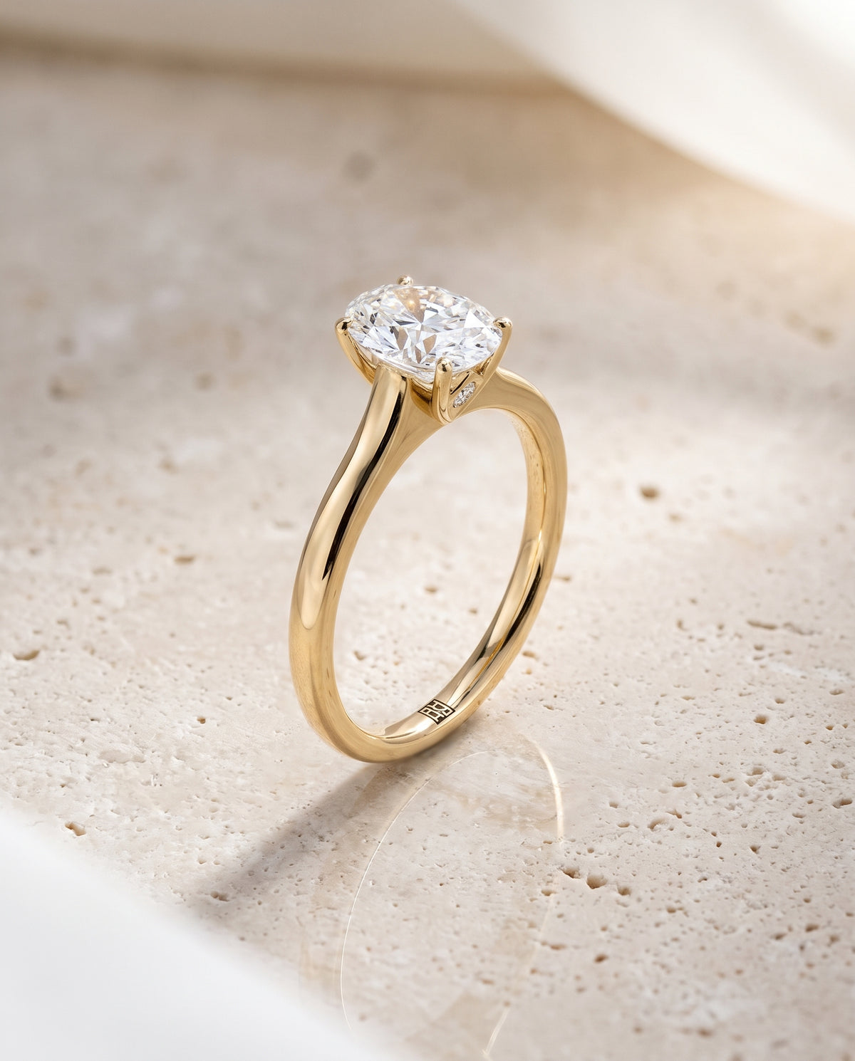 The Rosanna Cathedral Surprise Stone Solitaire Oval Engagement Ring Setting in 18K Yellow Gold