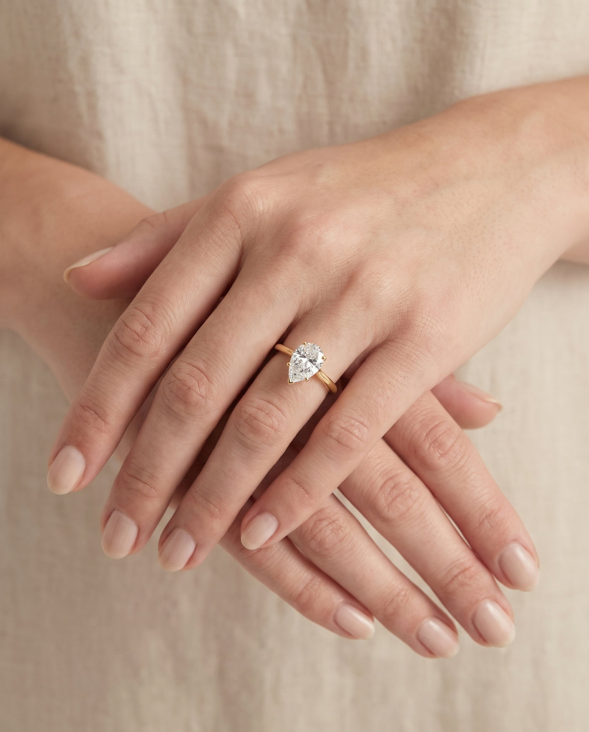 The Rosanna Cathedral Surprise Stone Solitaire Pear Engagement Ring Setting in 18K Yellow Gold