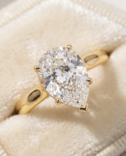 The Rosanna Cathedral Surprise Stone Solitaire Pear Engagement Ring Setting in 18K Yellow Gold
