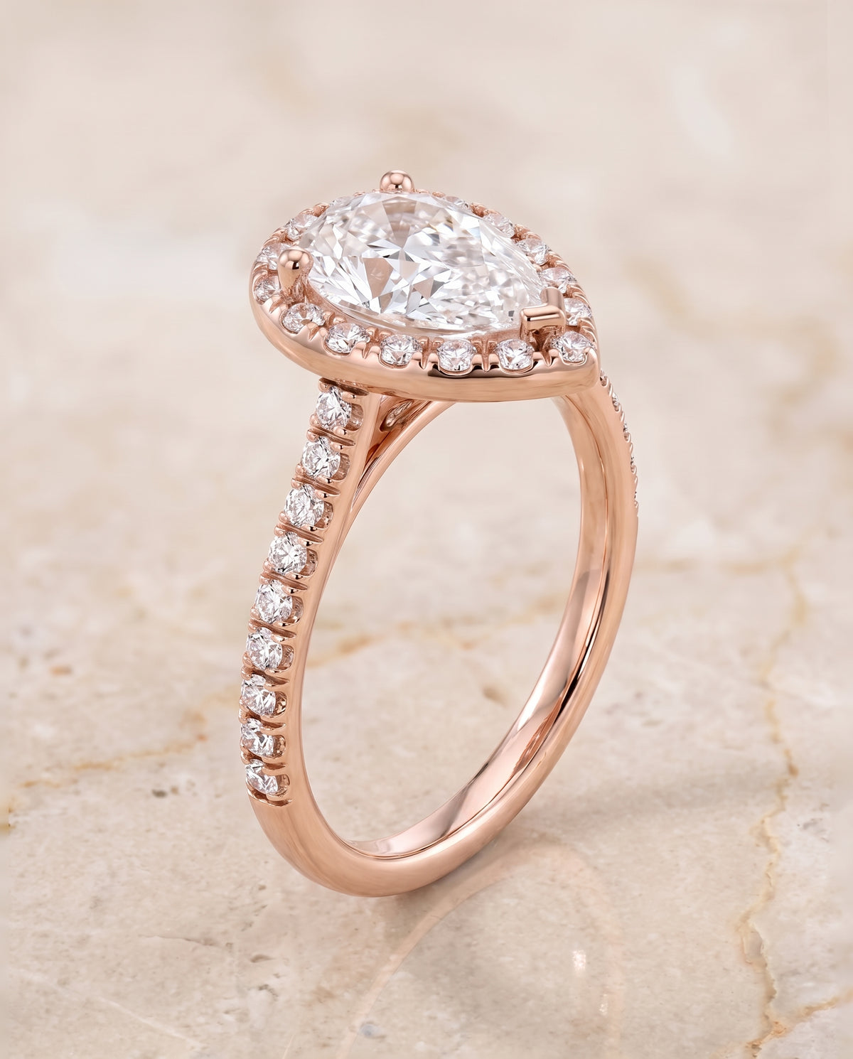 The Sade Classic French Pavé Halo Linear Pear Engagement Ring Setting in 14K Rose Gold
