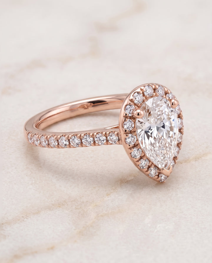 The Sade Classic French Pavé Halo Linear Pear Engagement Ring Setting in 14K Rose Gold