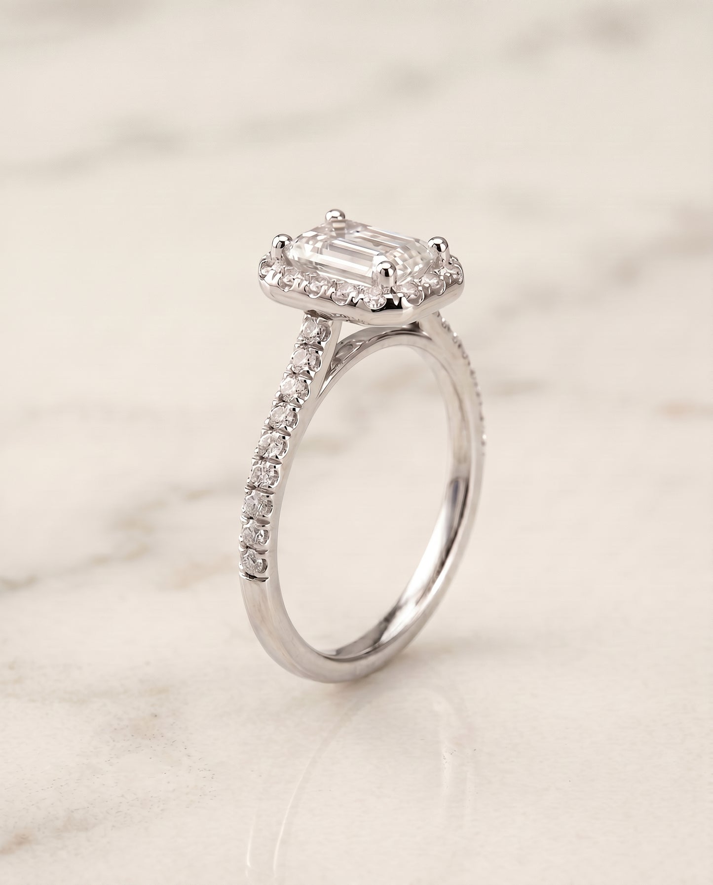 The Sade Classic French Pavé Halo Linear Emerald Cut Engagement Ring Setting in Platinum