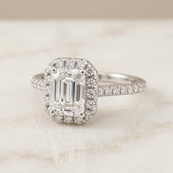 The Sade Classic French Pavé Halo Linear Emerald Cut Engagement Ring Setting in 18K White Gold