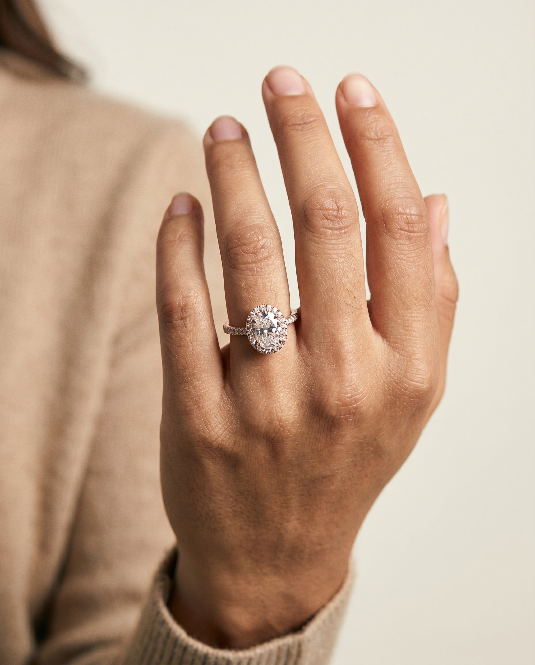 The Sade engagement ring setting in 14K Rose Gold, classic french pavé halo linear design | RockHer