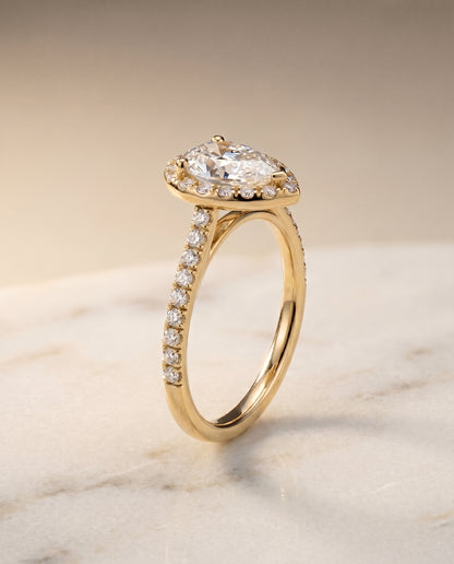 The Sade Classic French Pavé Halo Linear Pear Engagement Ring Setting in 18K Yellow Gold