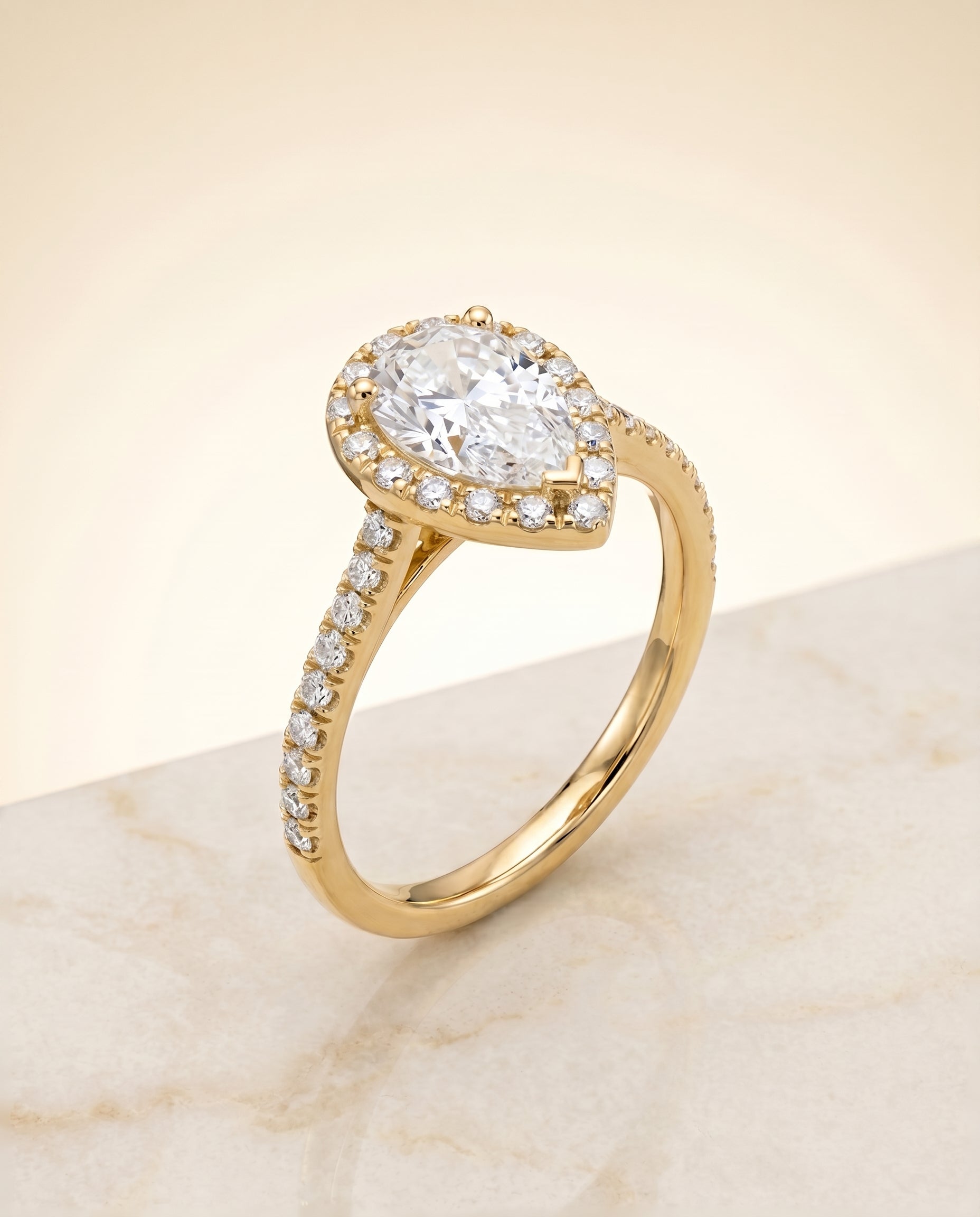 Select Halo styling on The Sade pear engagement ring setting | RockHer