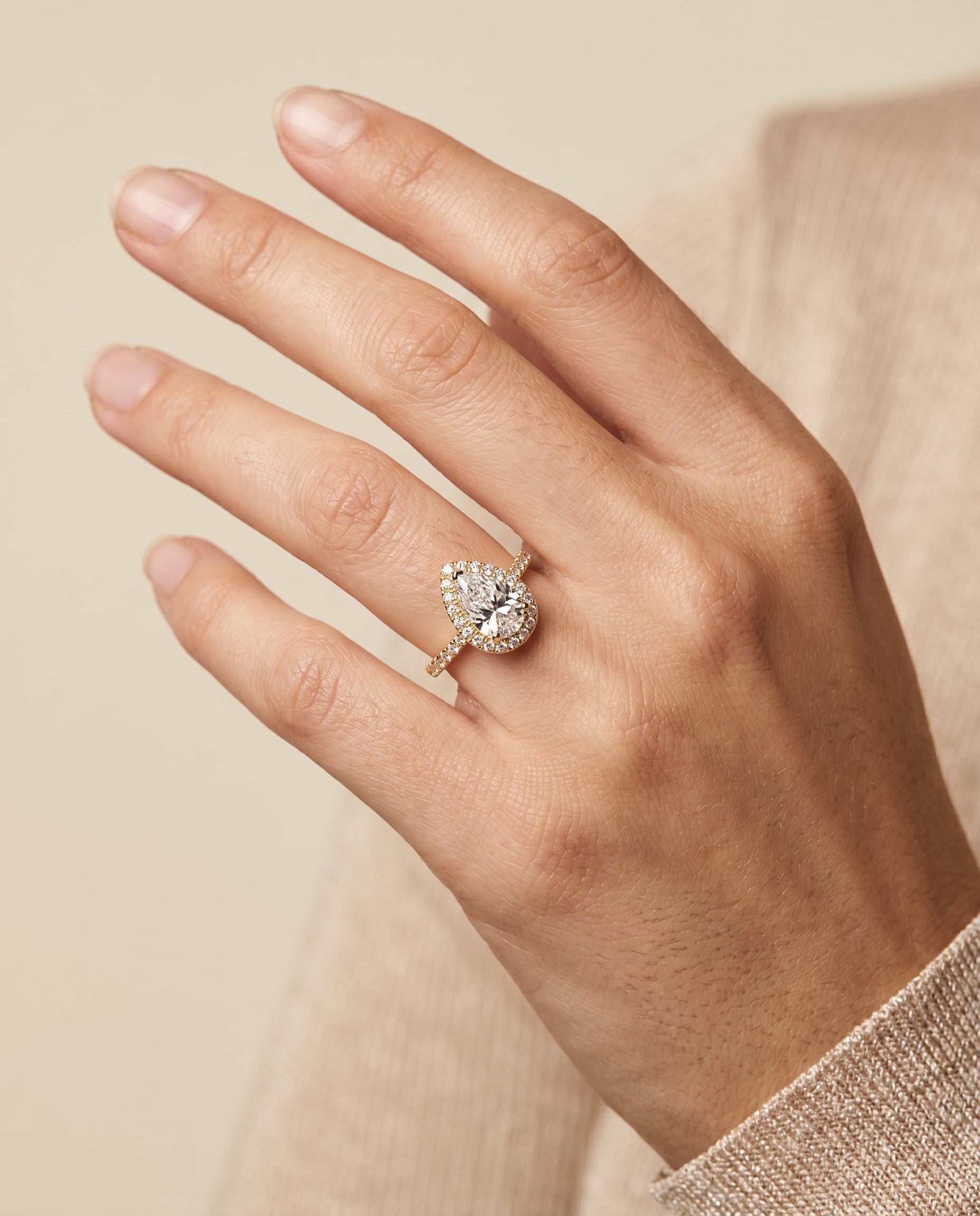 Sade Select Halo Pear Lab Diamond Engagement Ring in 18K Yellow Gold, shown on hand | RockHer