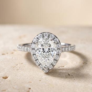 The Sade Classic French Pavé Halo Linear Pear Engagement Ring Setting in 18K White Gold