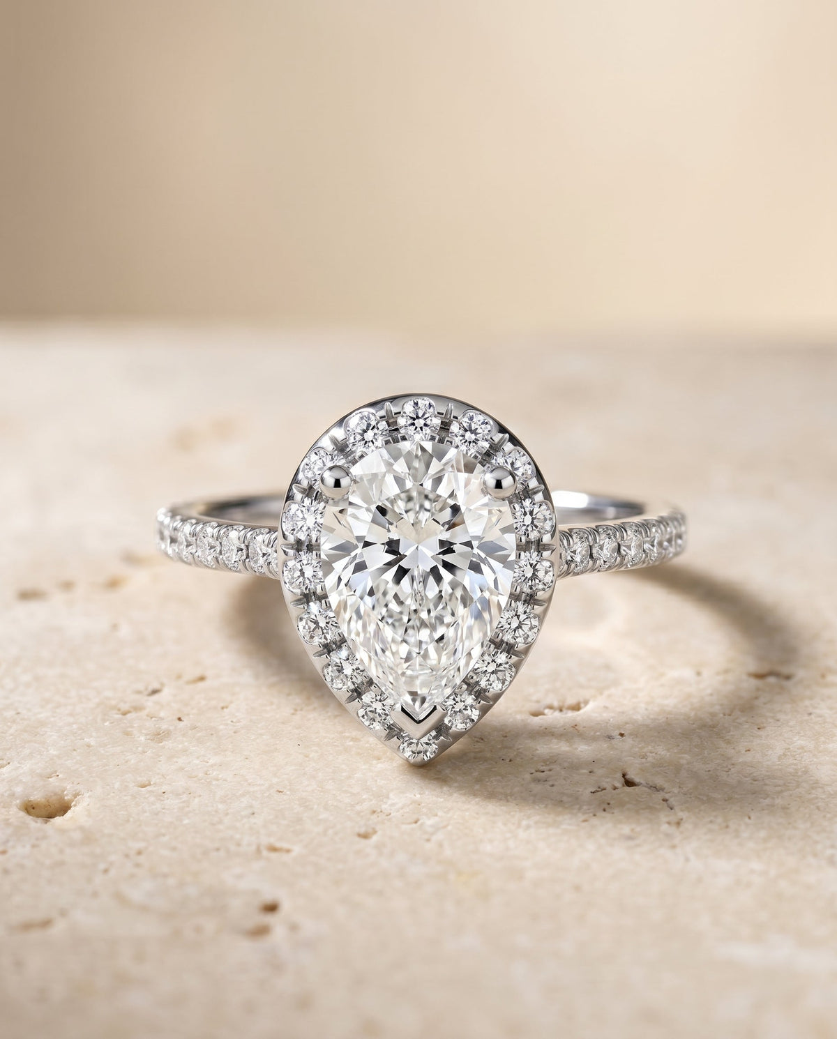 Sade Select Halo Pear Lab Diamond Engagement Ring in 18K White Gold, shown on hand, angled | RockHer