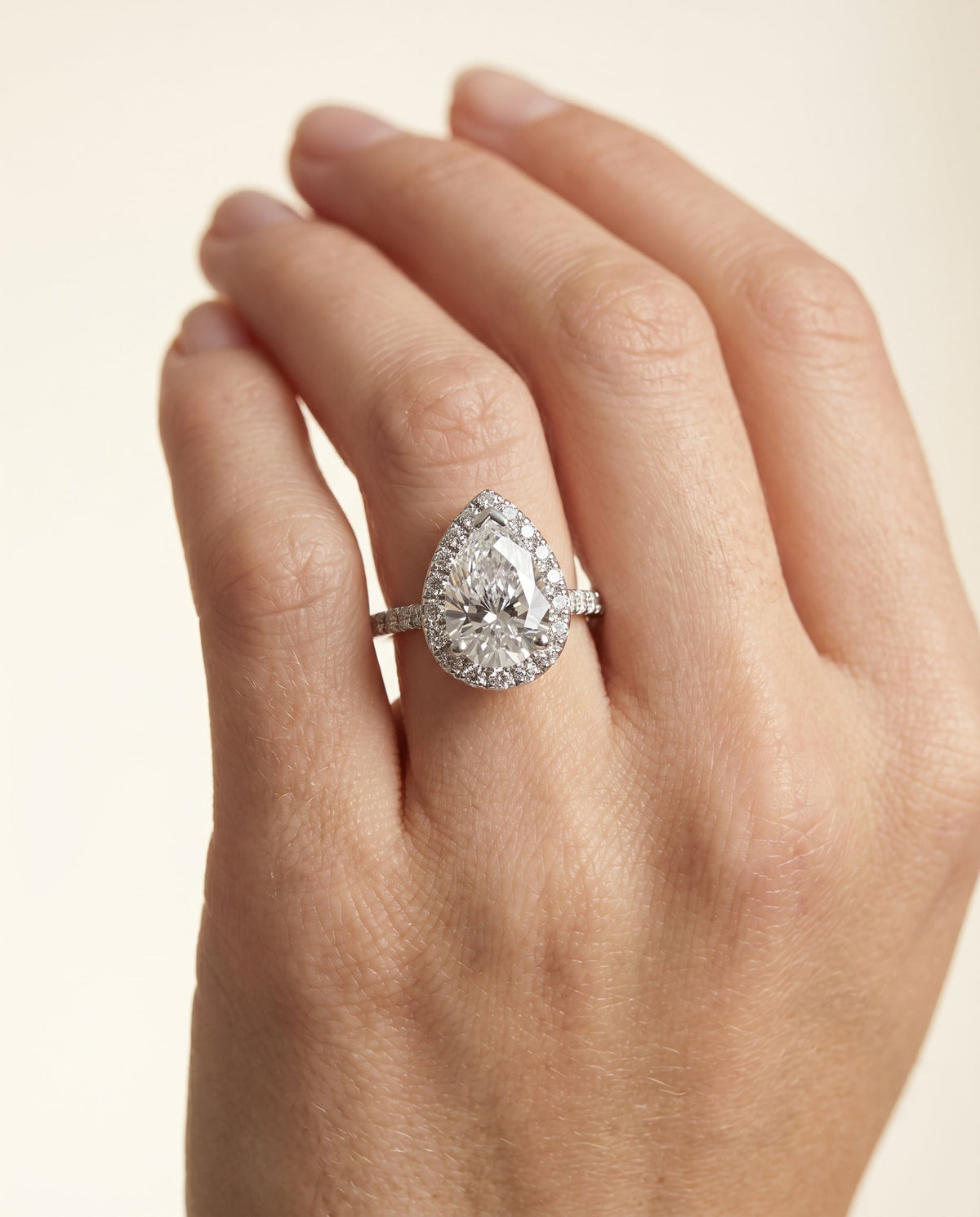 Sade Select Halo Pear Lab Diamond Engagement Ring in 18K White Gold, shown on hand | RockHer