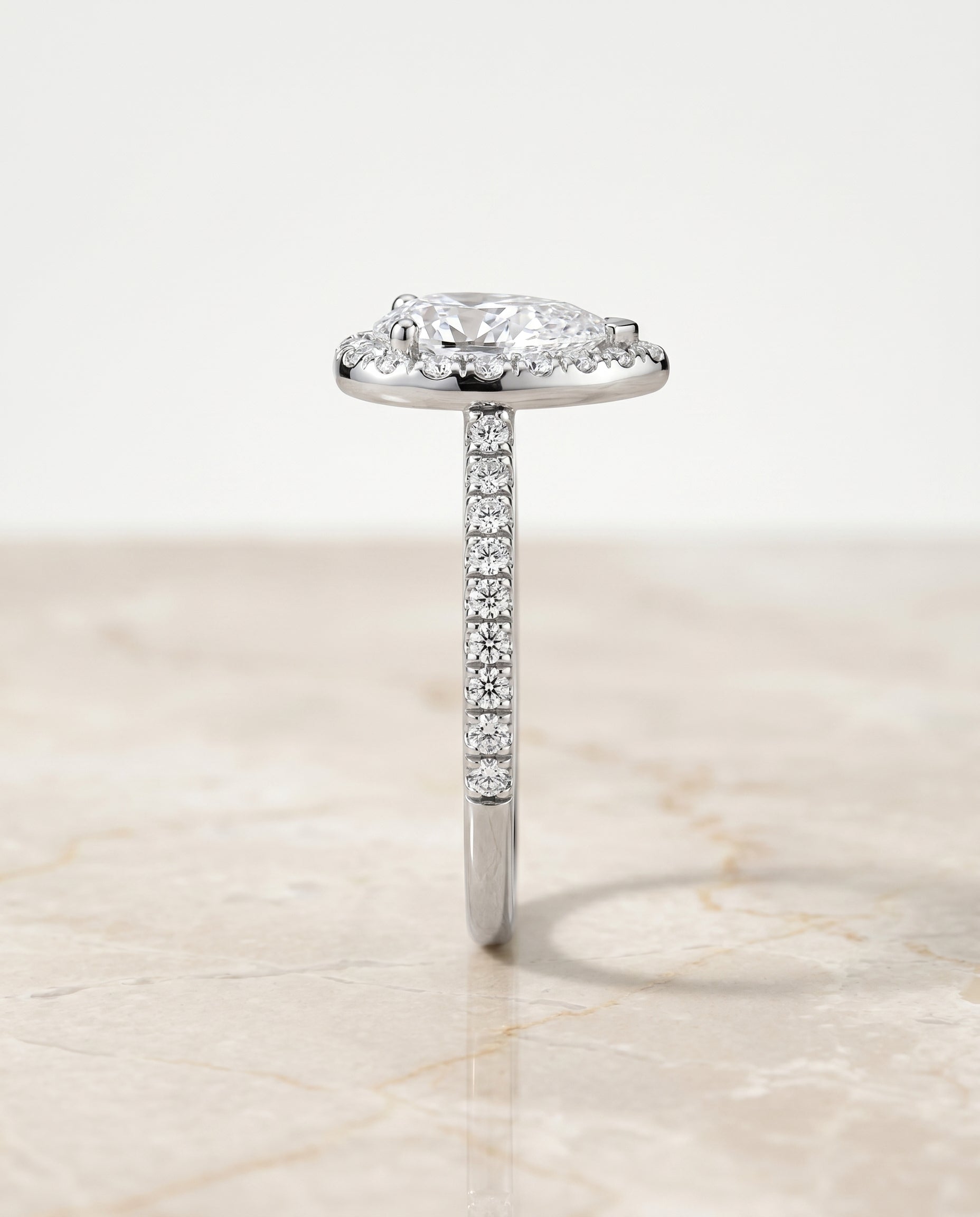 Sade Select Halo Pear Lab Diamond Engagement Ring in Platinum, side view | RockHer