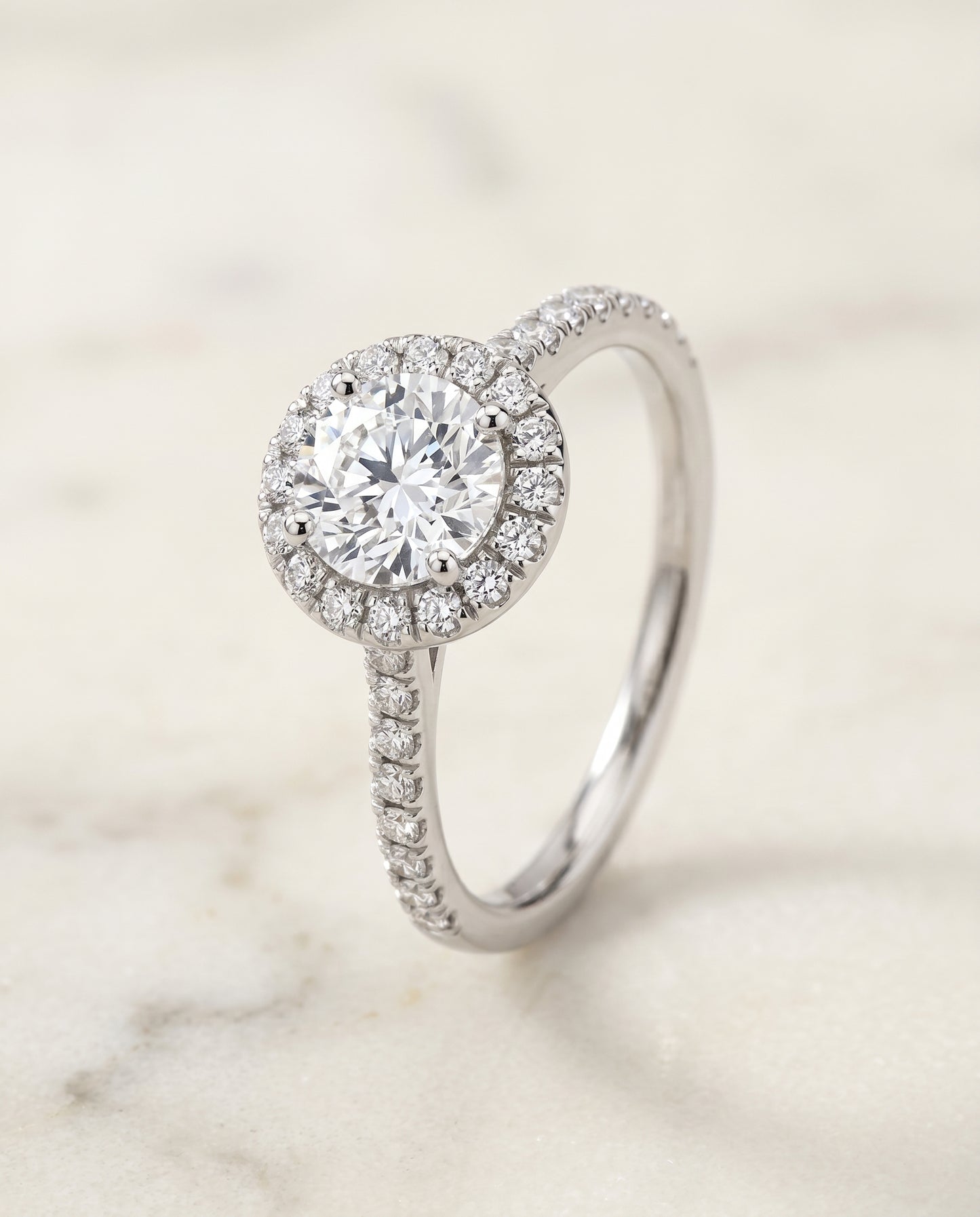 The Sade Classic French Pavé Halo Linear Round Engagement Ring Setting in Platinum