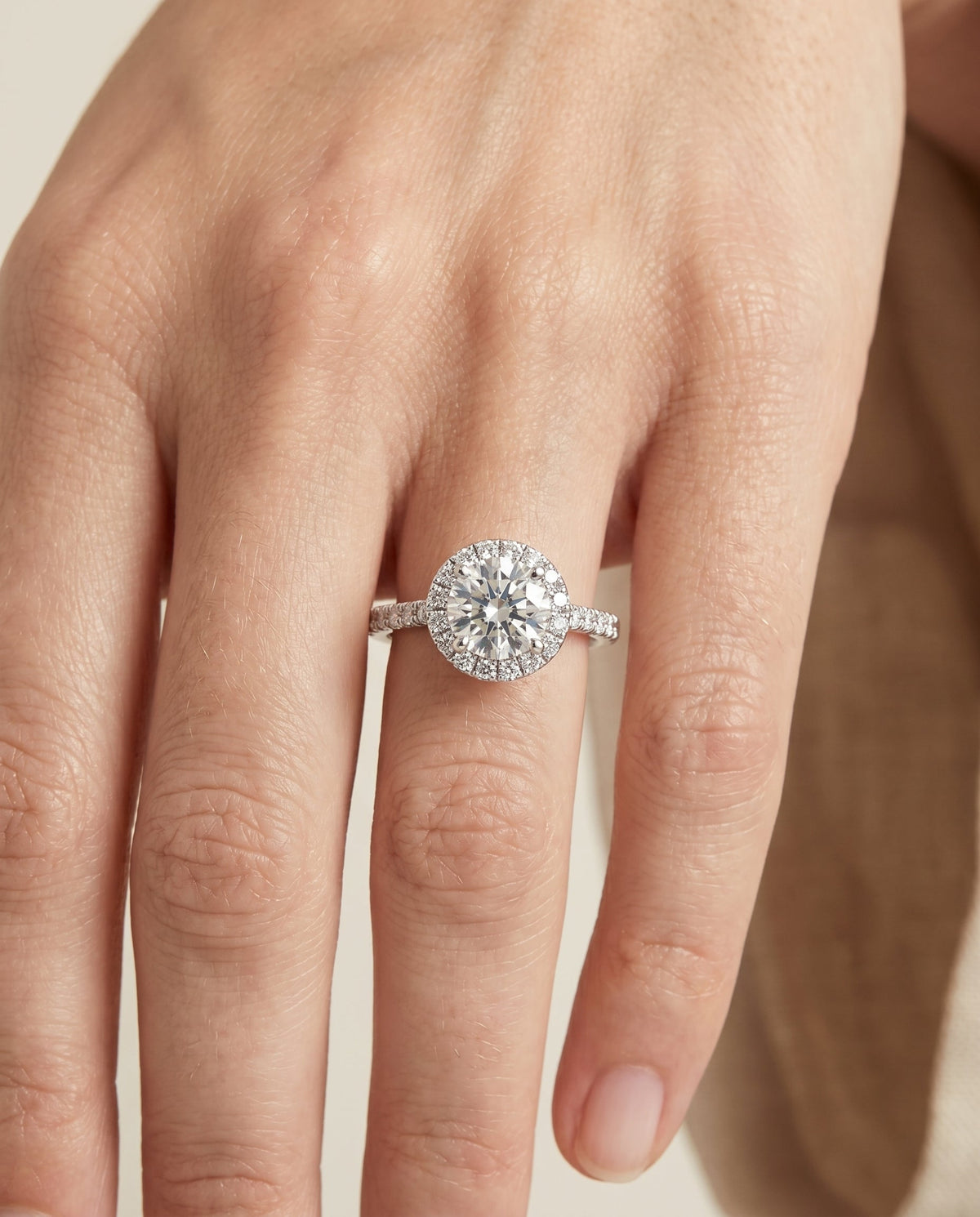 Sade Select Halo Round Lab Diamond Engagement Ring in 18K White Gold, shown on hand | RockHer