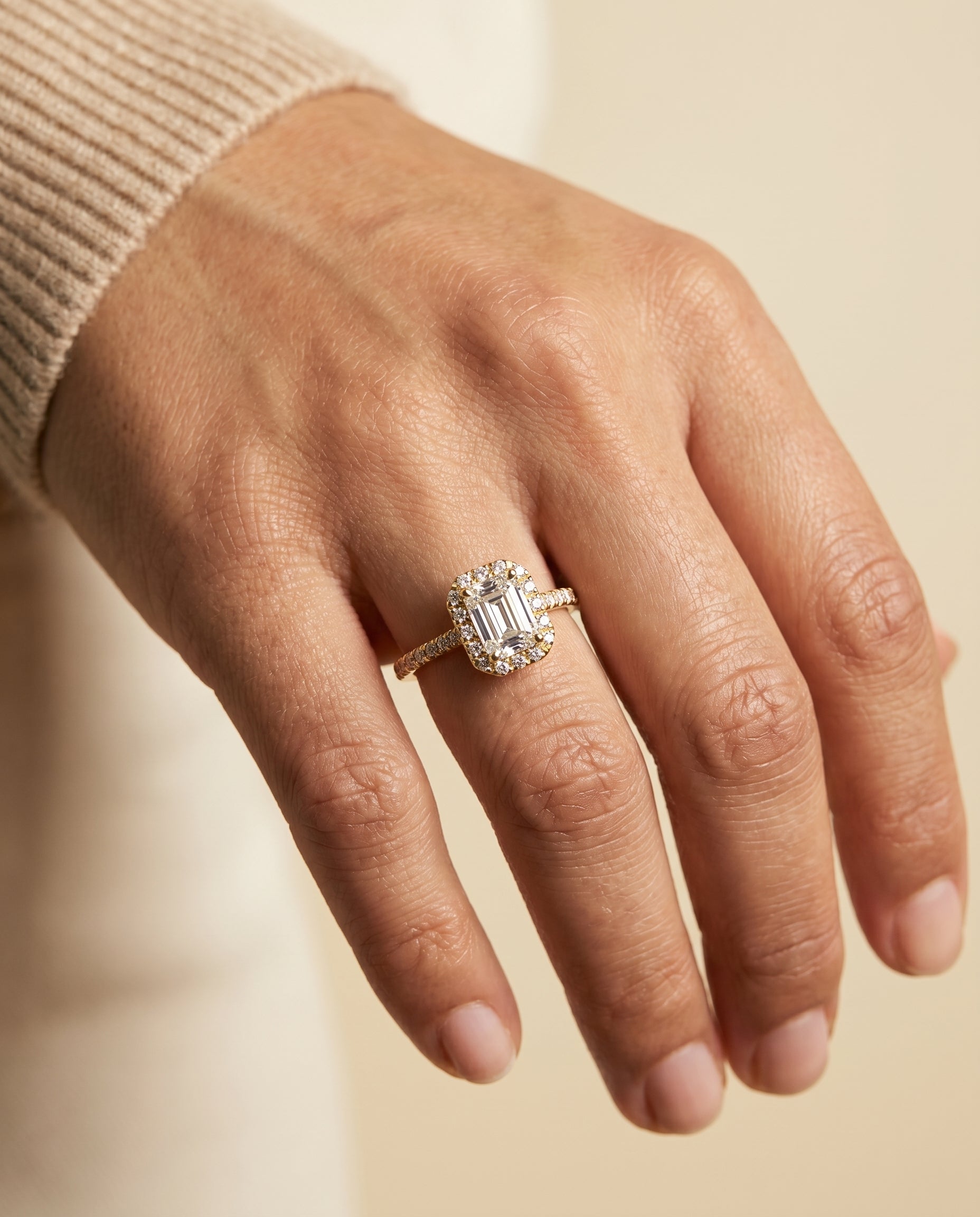 The Sade engagement ring setting in 18K Yellow Gold, classic french pavé halo linear cut design | RockHer