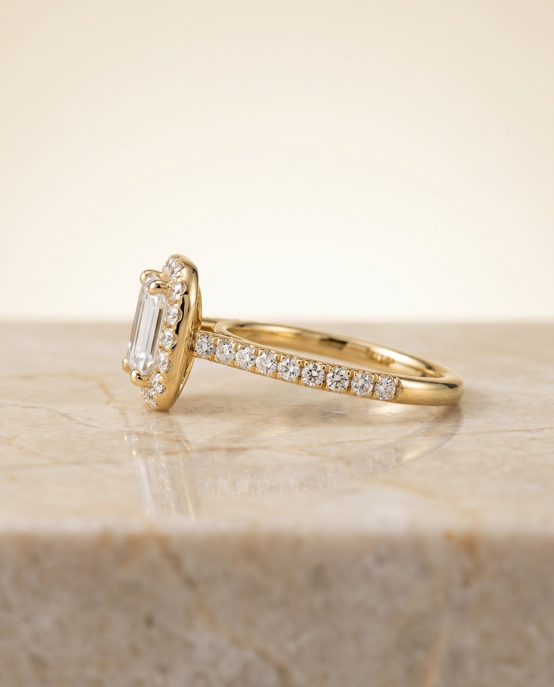 Sade Select Halo Emerald Cut Lab Diamond Engagement Ring in 18K Yellow Gold, side view | RockHer