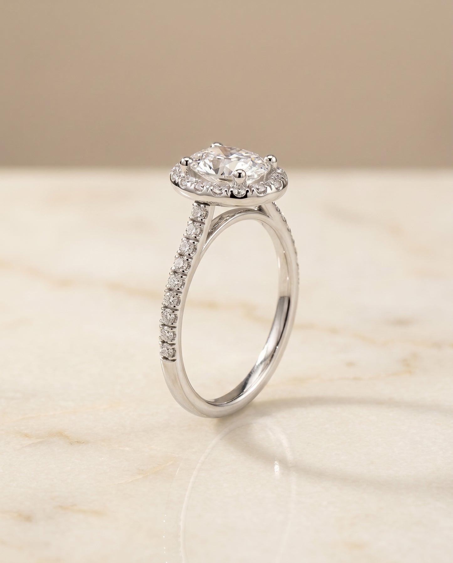 The Sade Pavé Halo Engagement Ring Setting for Oval Diamonds in 18K White Gold