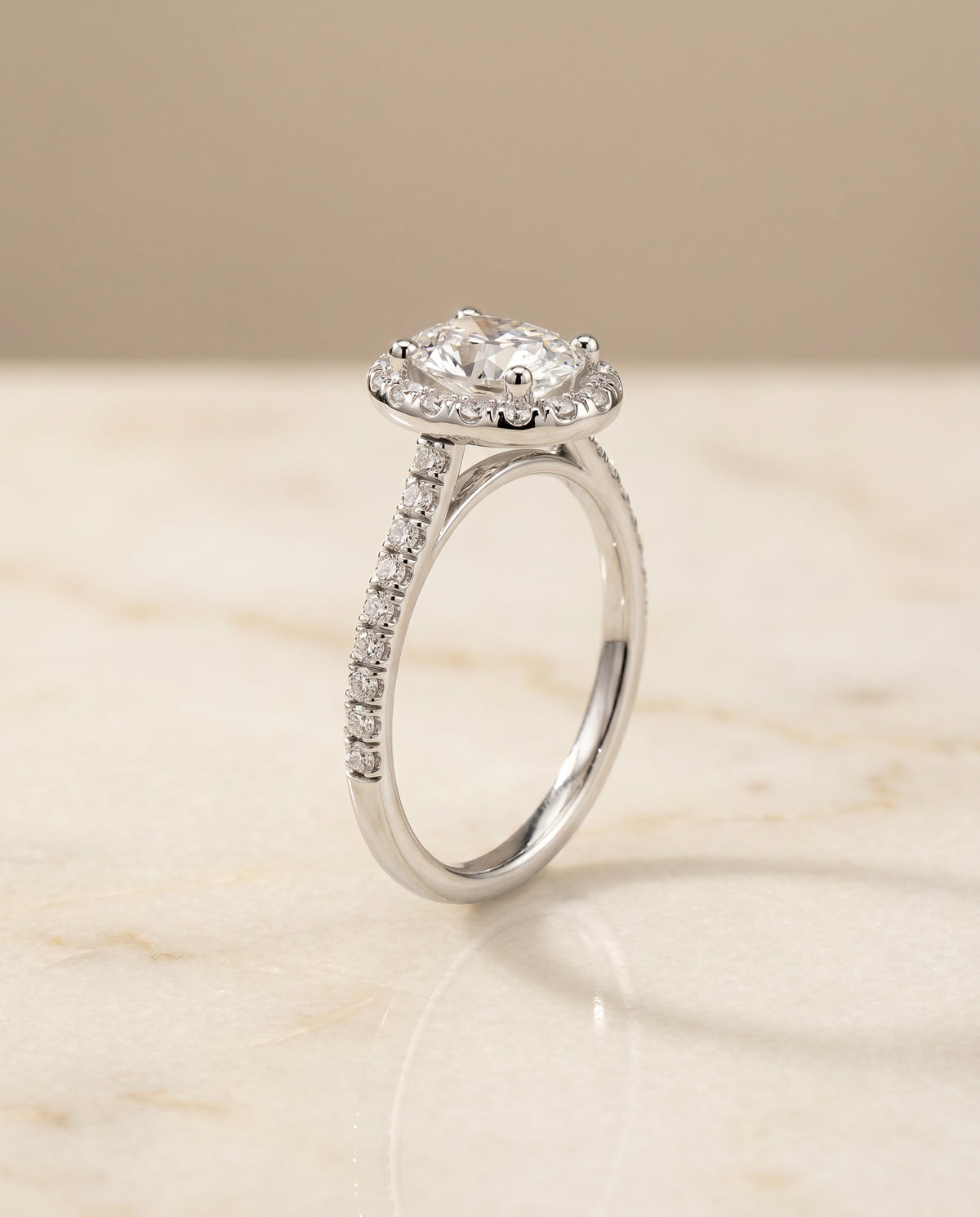 Classic French Pavé Halo Linear styling on The Sade oval engagement ring setting | RockHer