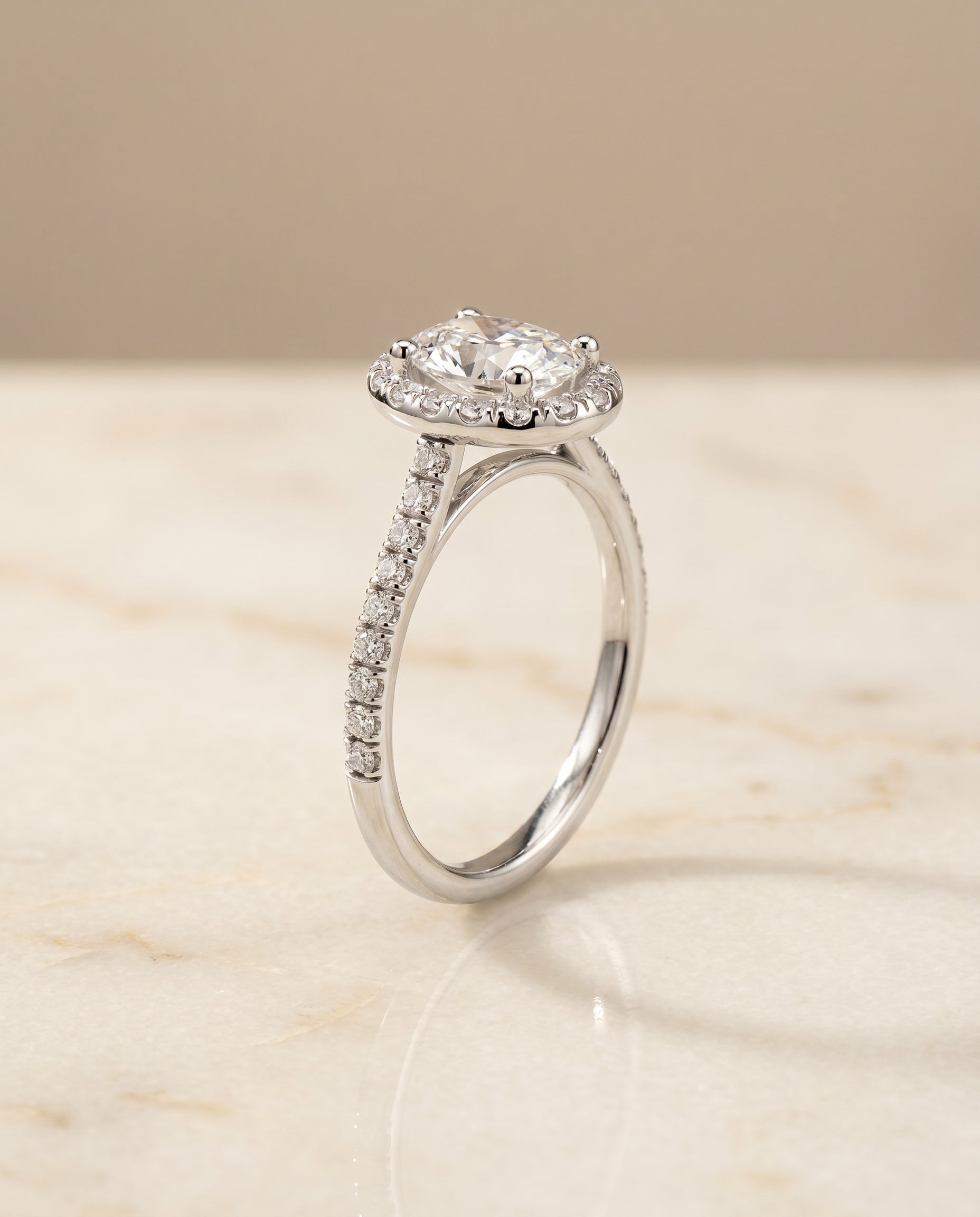 Sade Select Classic French Pavé Halo Linear Oval Lab Diamond Engagement Ring in Platinum, front view | RockHer