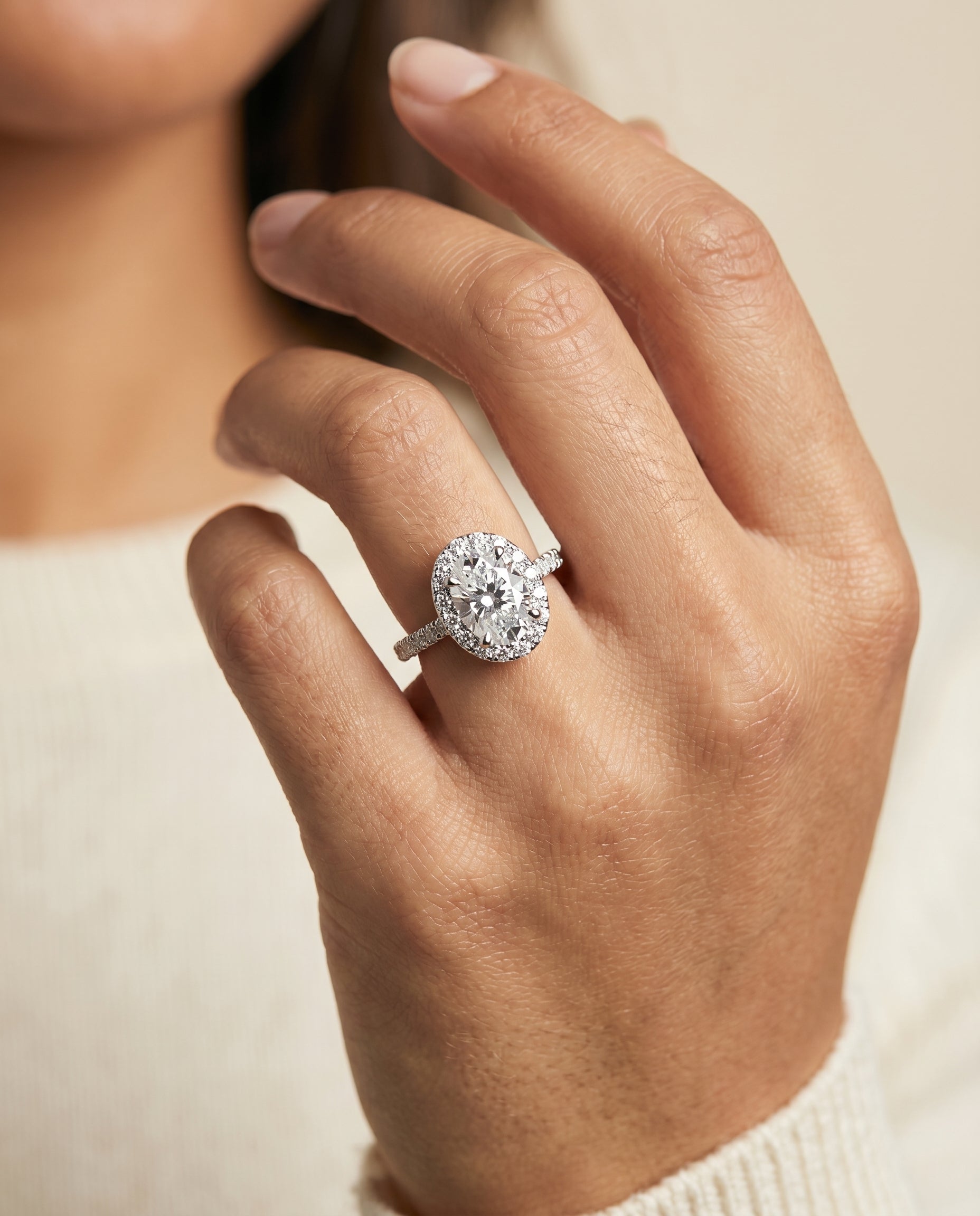 Sade Select Classic French Pavé Halo Linear Oval Lab Diamond Engagement Ring in 18K White Gold, shown on hand | RockHer