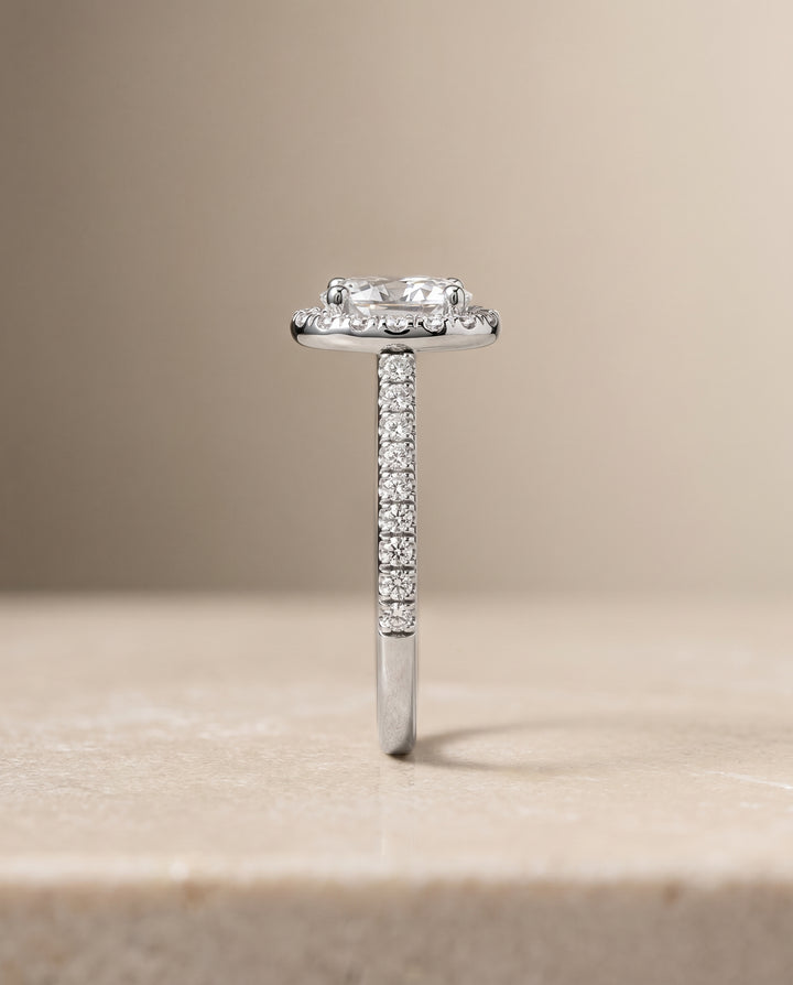 The Sade Pavé Halo Engagement Ring Setting for Oval Diamonds in 18K White Gold
