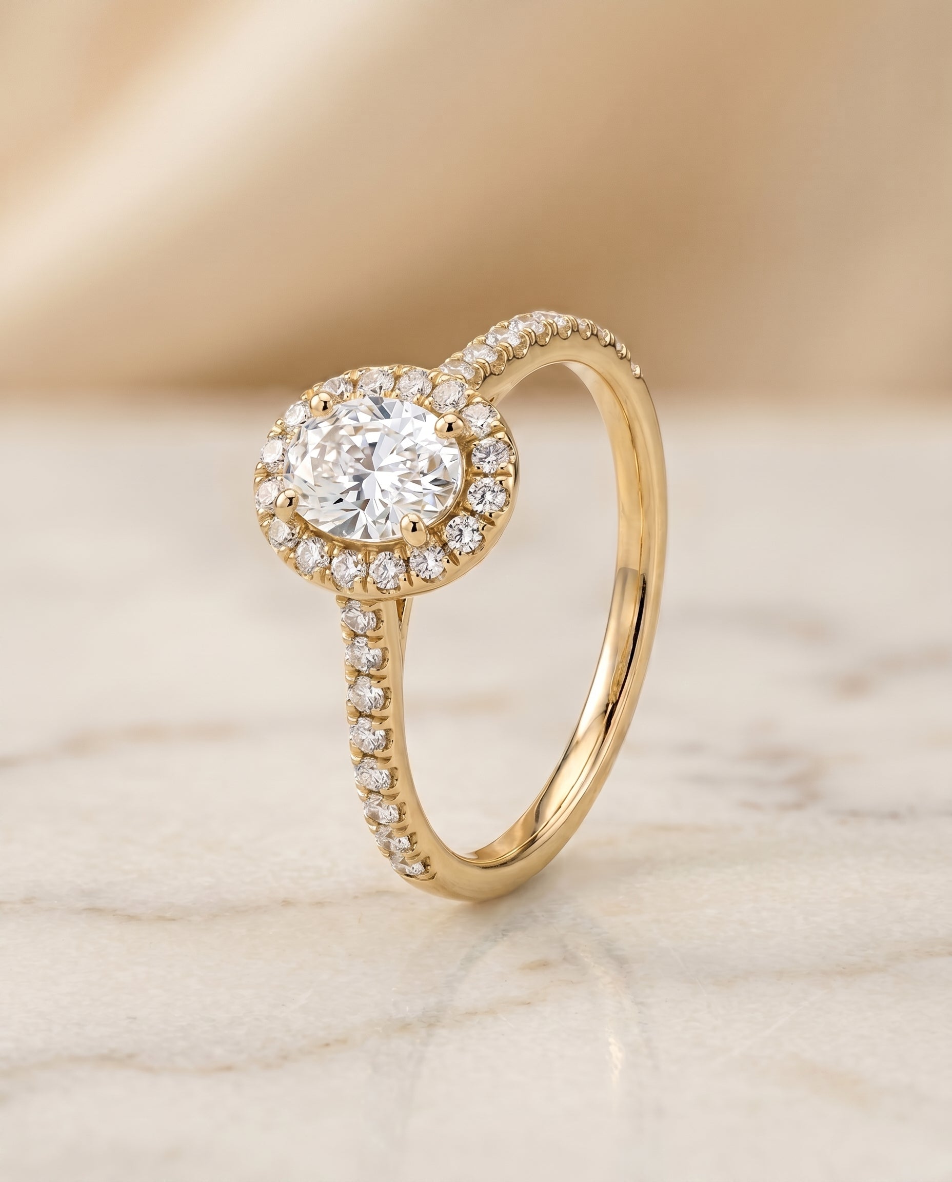 The Sade setting for oval diamonds, made to order in 18K Yellow Gold | RockHer