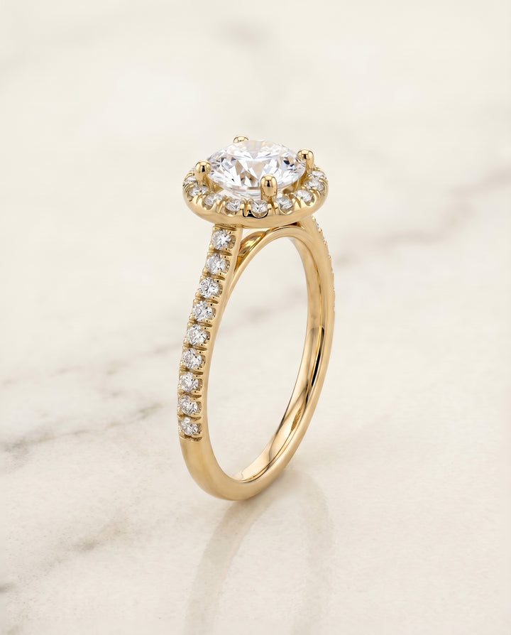 The Sade Pavé Halo Engagement Ring Setting for Round Diamonds in 18K Yellow Gold