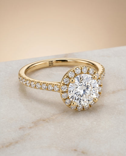 The Sade Classic French Pavé Halo Linear Round Engagement Ring Setting in 18K Yellow Gold
