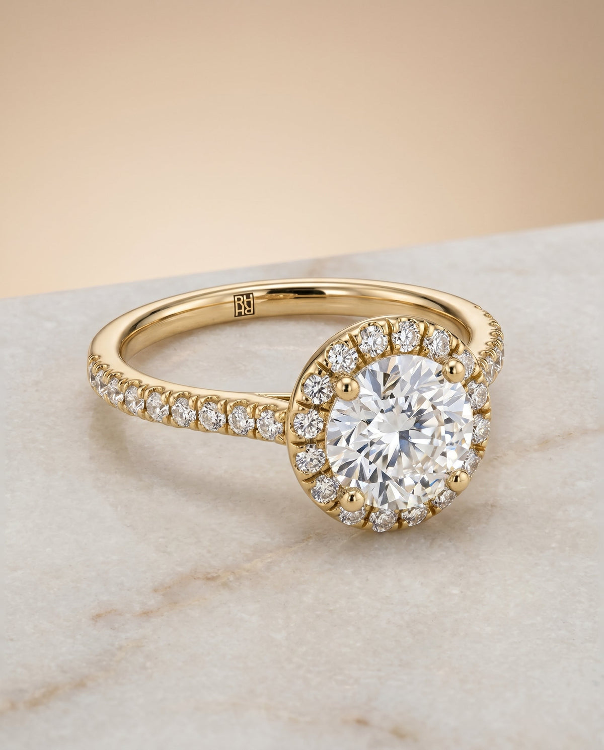 Sade Select Halo Round Lab Diamond Engagement Ring in 18K Yellow Gold, shown on hand, angled | RockHer