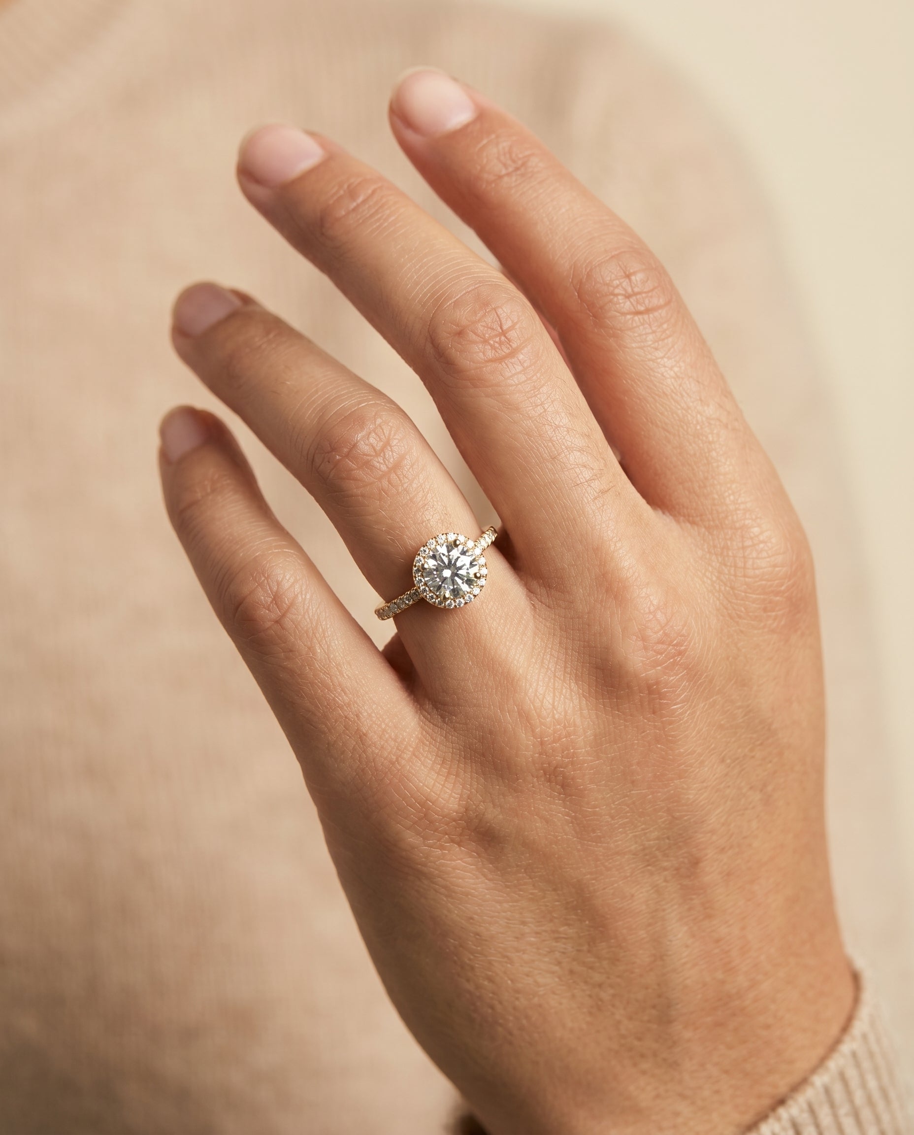 Sade Select Halo Round Lab Diamond Engagement Ring in 18K Yellow Gold, shown on hand | RockHer