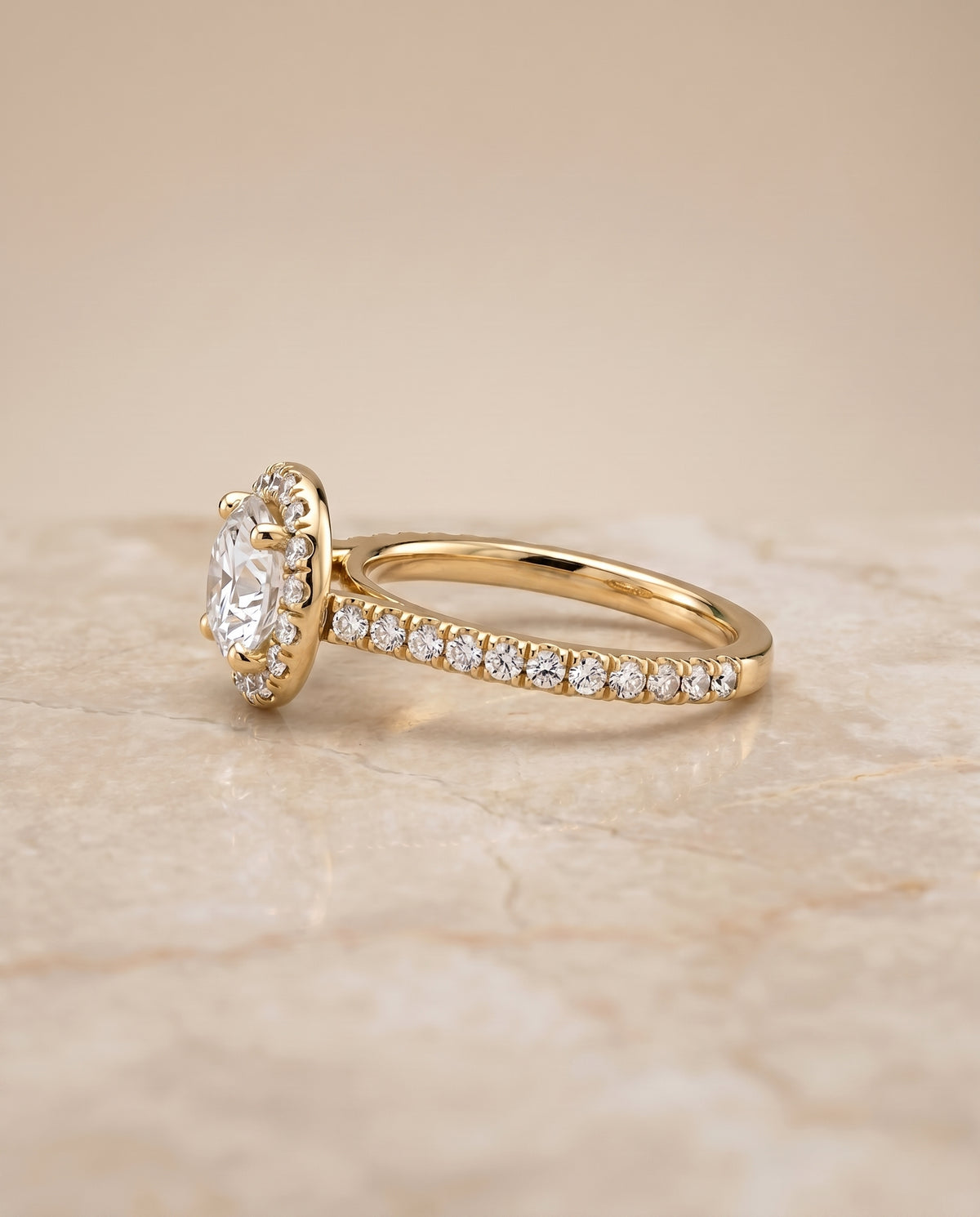 The Sade setting for round diamonds, made to order in 18K Yellow Gold | RockHer