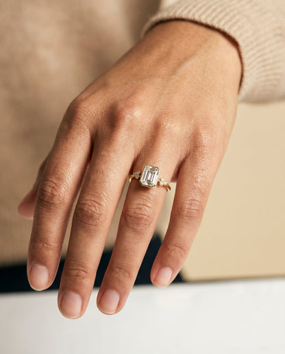 The Selena Clover Bezel Accent Solitaire Emerald Cut Engagement Ring Setting in 18K Yellow Gold