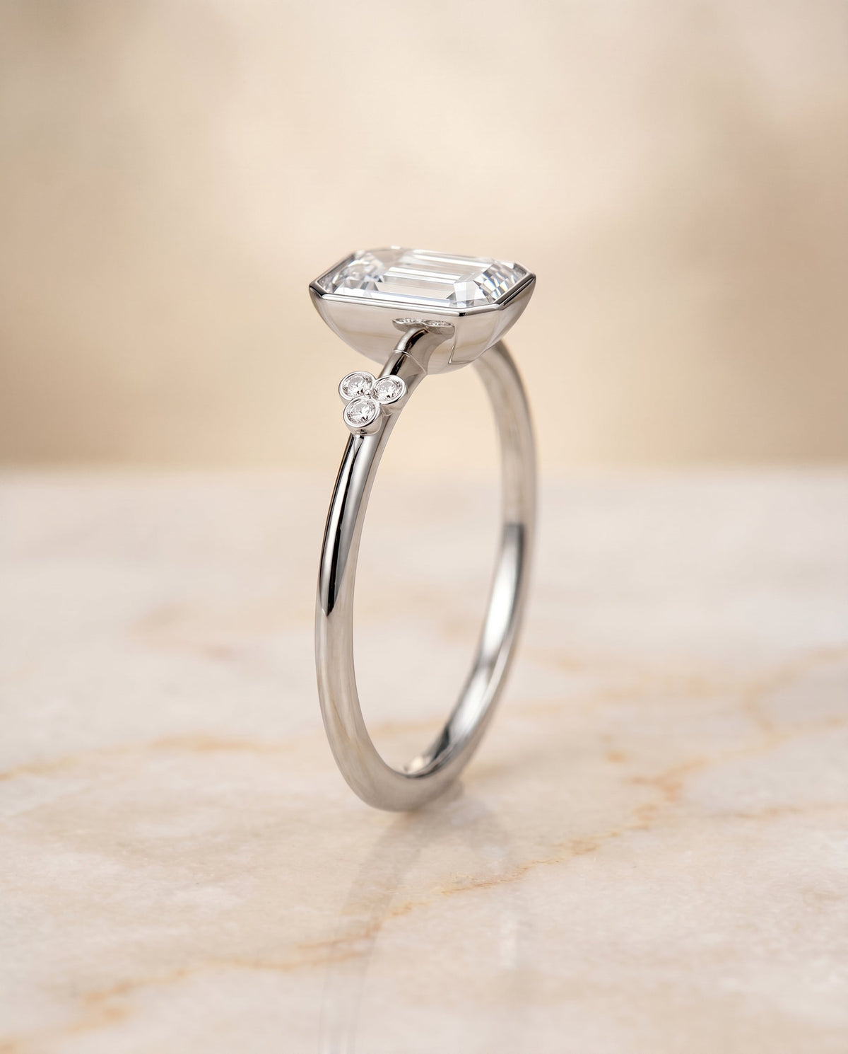 Select Clover Bezel Accent Solitaire Cut styling on The Selena emerald engagement ring setting | RockHer