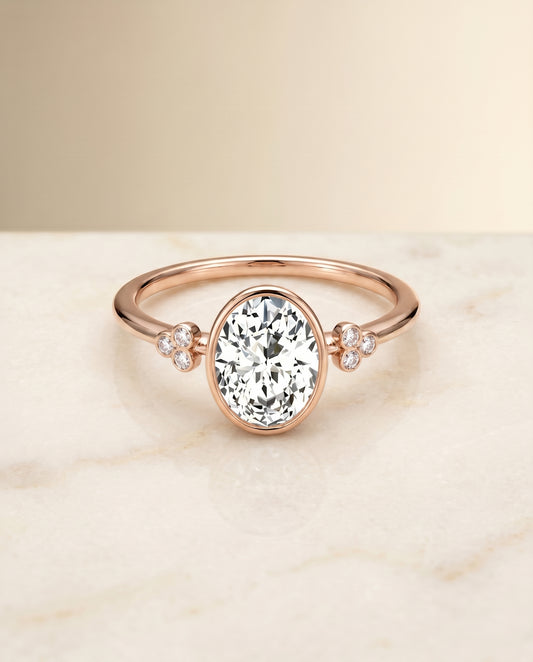 The Selena Bezel Solitaire Engagement Ring Setting for Oval Diamonds in 14K Rose Gold