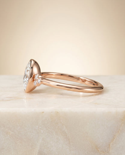 Selena Select Clover Bezel Accent Solitaire Oval Lab Diamond Engagement Ring in 14K Rose Gold, side view | RockHer
