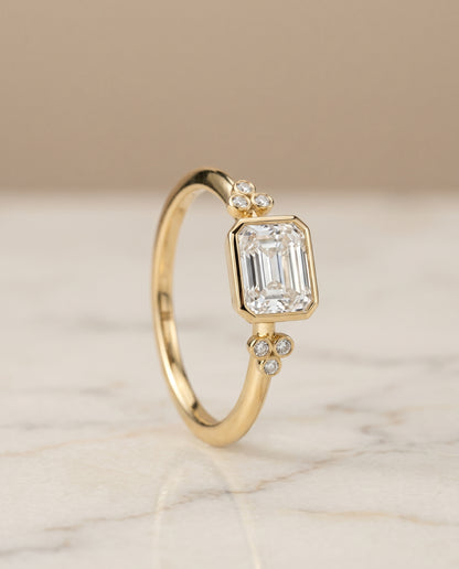 The Selena Clover Bezel Accent Solitaire Radiant Cut Engagement Ring Setting in 18K Yellow Gold