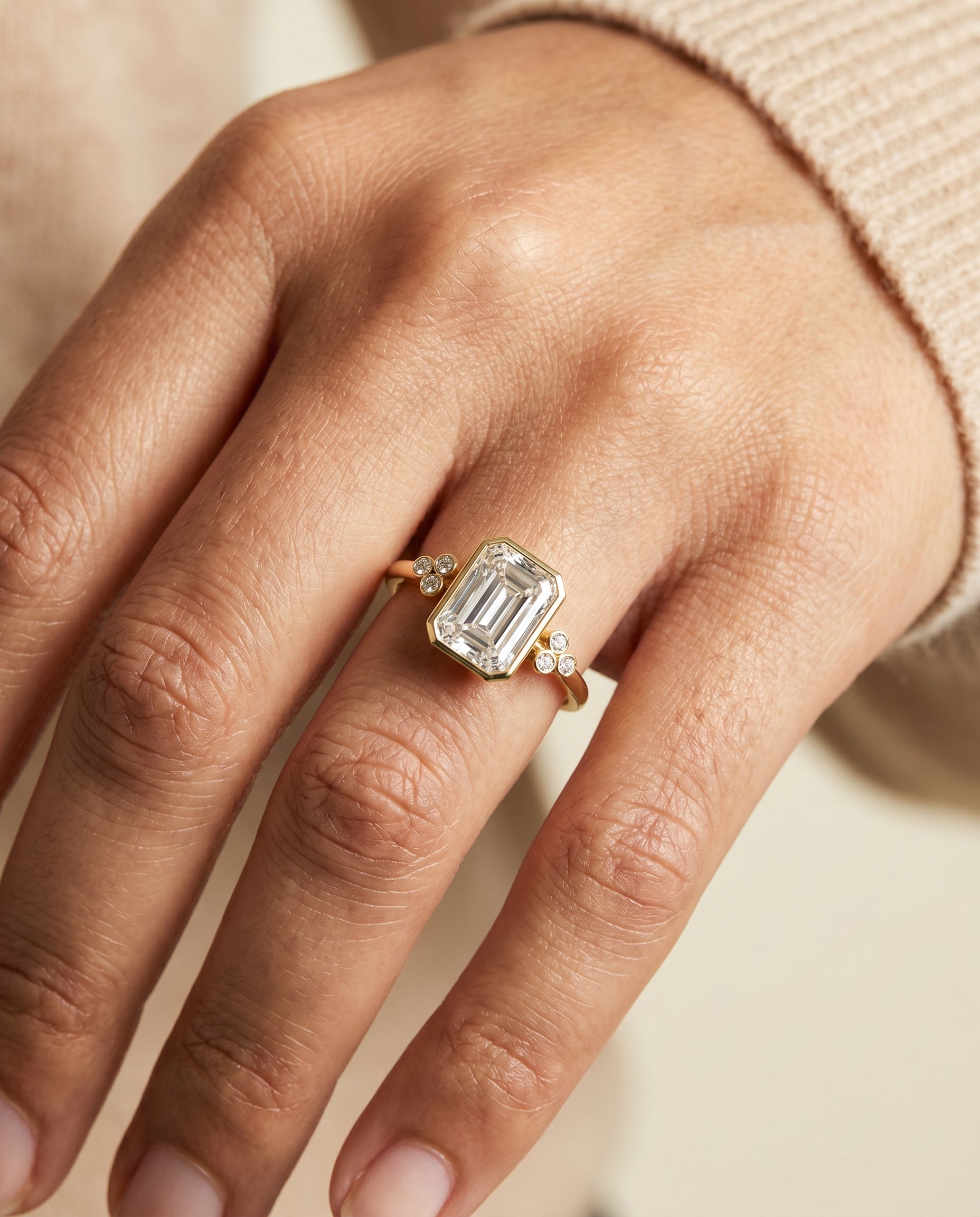 The Selena engagement ring setting in 18K Yellow Gold, clover bezel accent solitaire cut design | RockHer