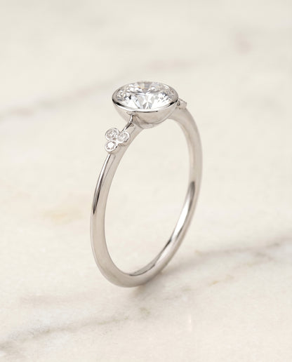 The Selena Clover Bezel Accent Solitaire Round Engagement Ring Setting in Platinum
