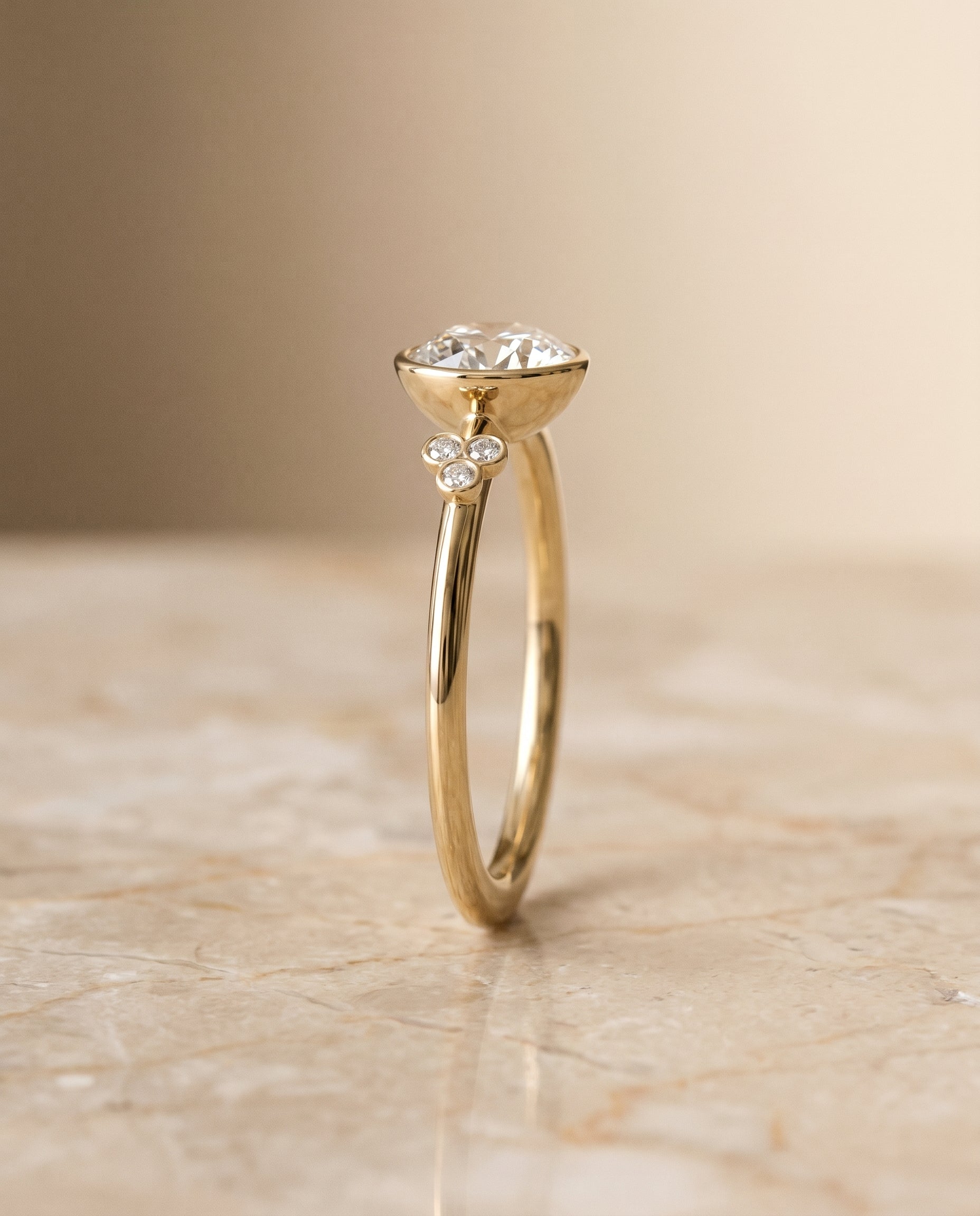 The Selena setting for round diamonds, made to order in 18K Yellow Gold | RockHer