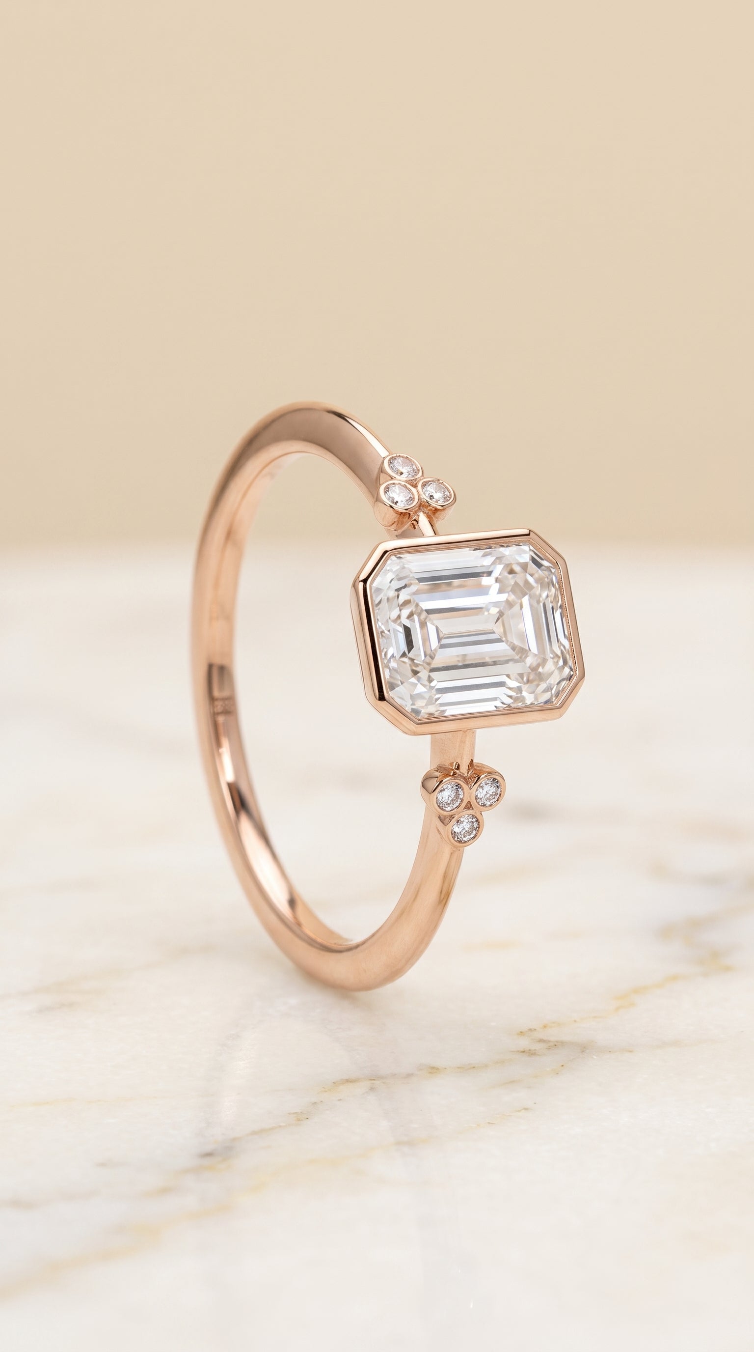 Clover Bezel Accent Solitaire Cut styling on The Selena emerald engagement ring setting | RockHer