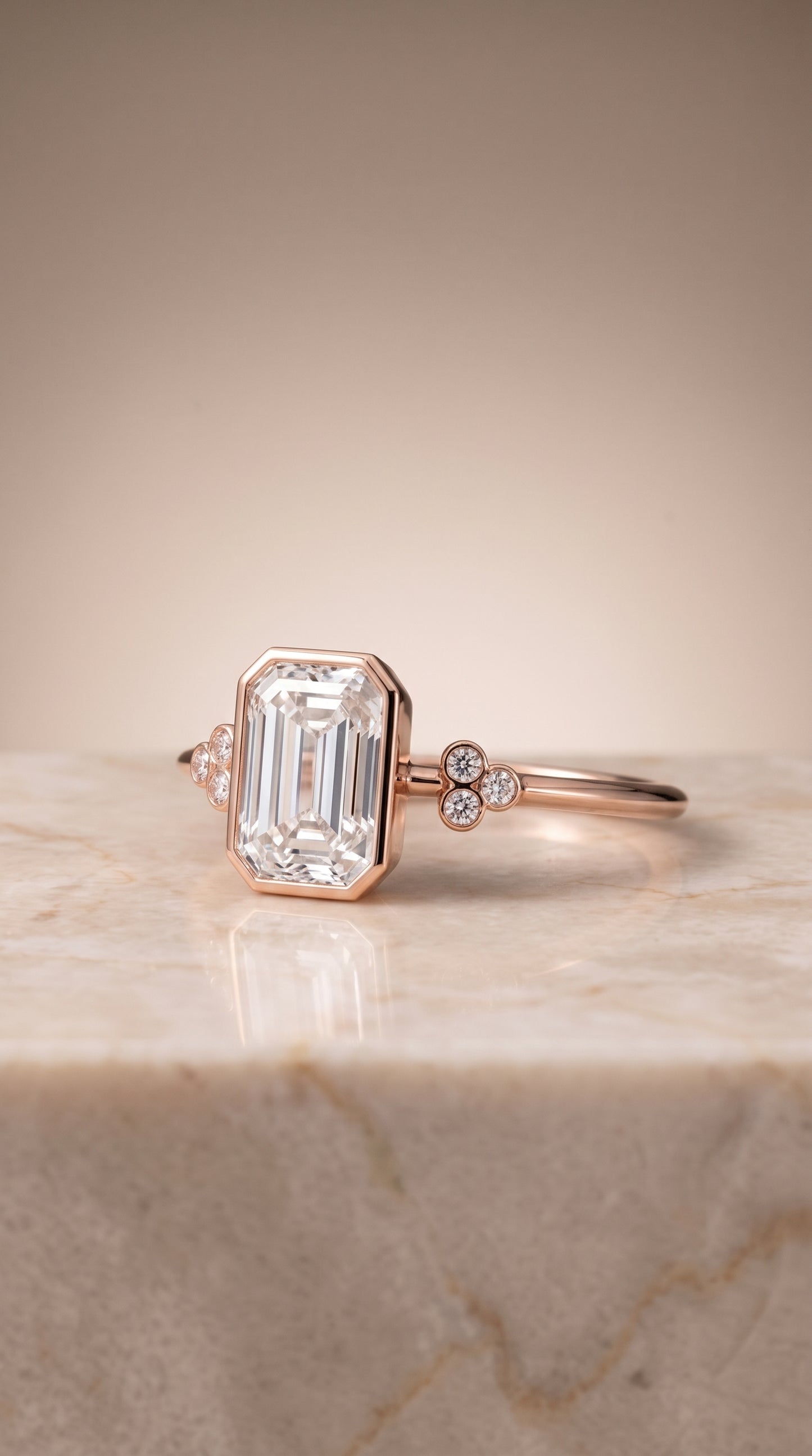 The Selena Clover Bezel Accent Solitaire Emerald Cut Engagement Ring Setting in 14K Rose Gold