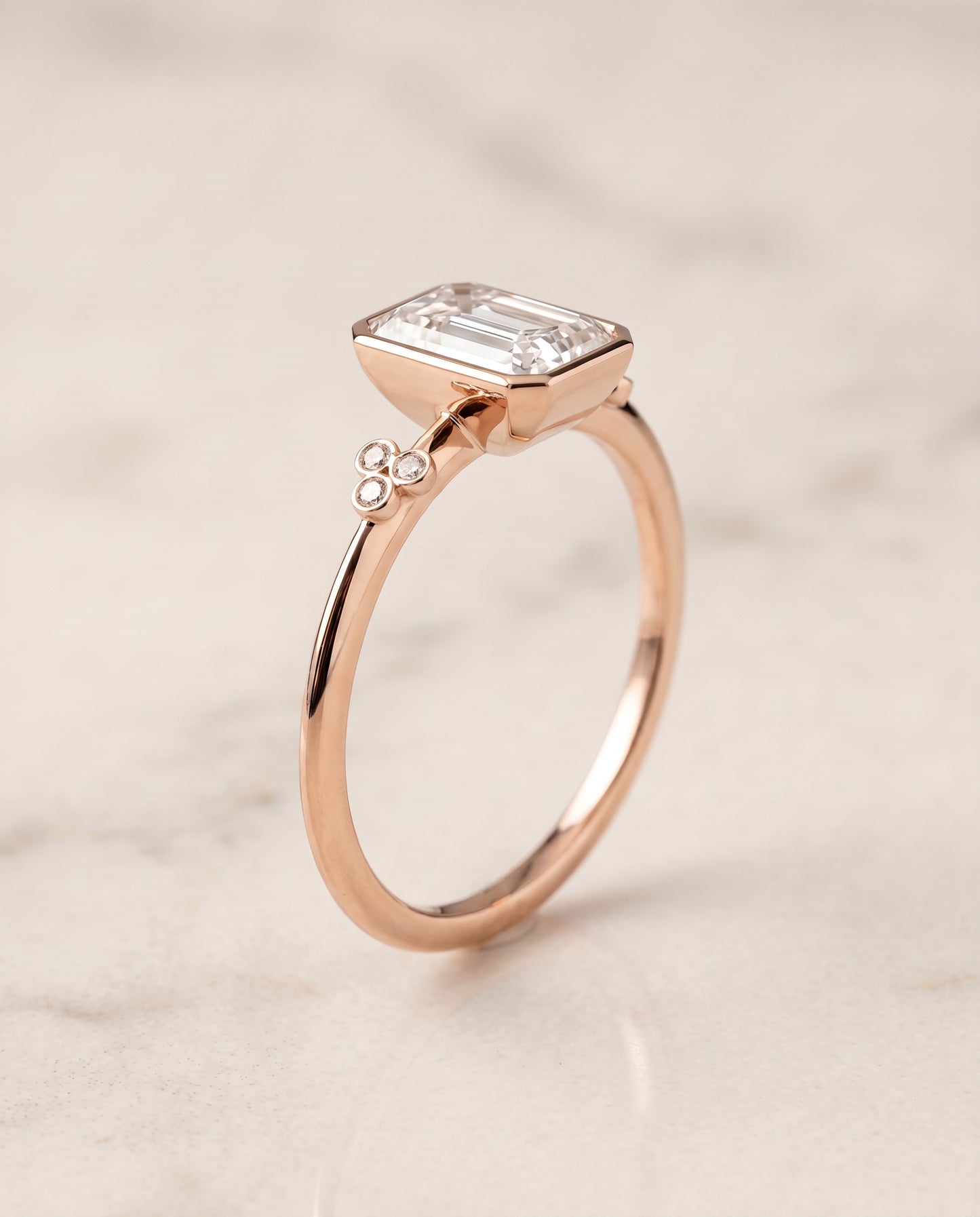 The Selena Clover Bezel Accent Solitaire Radiant Cut Engagement Ring Setting in 14K Rose Gold