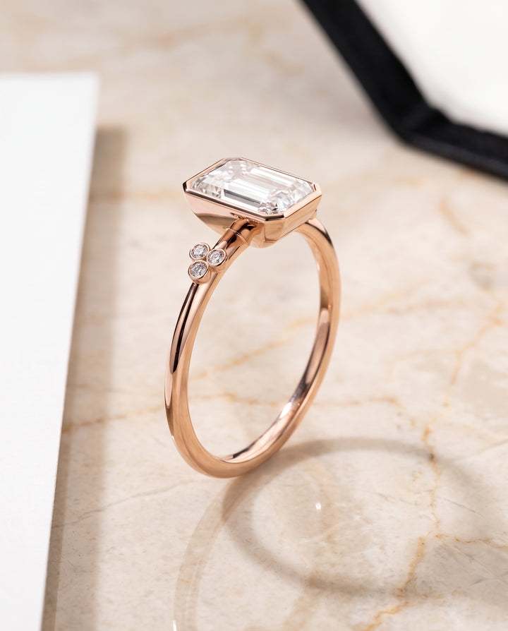 The Selena Clover Bezel Accent Solitaire Radiant Cut Engagement Ring Setting in 14K Rose Gold