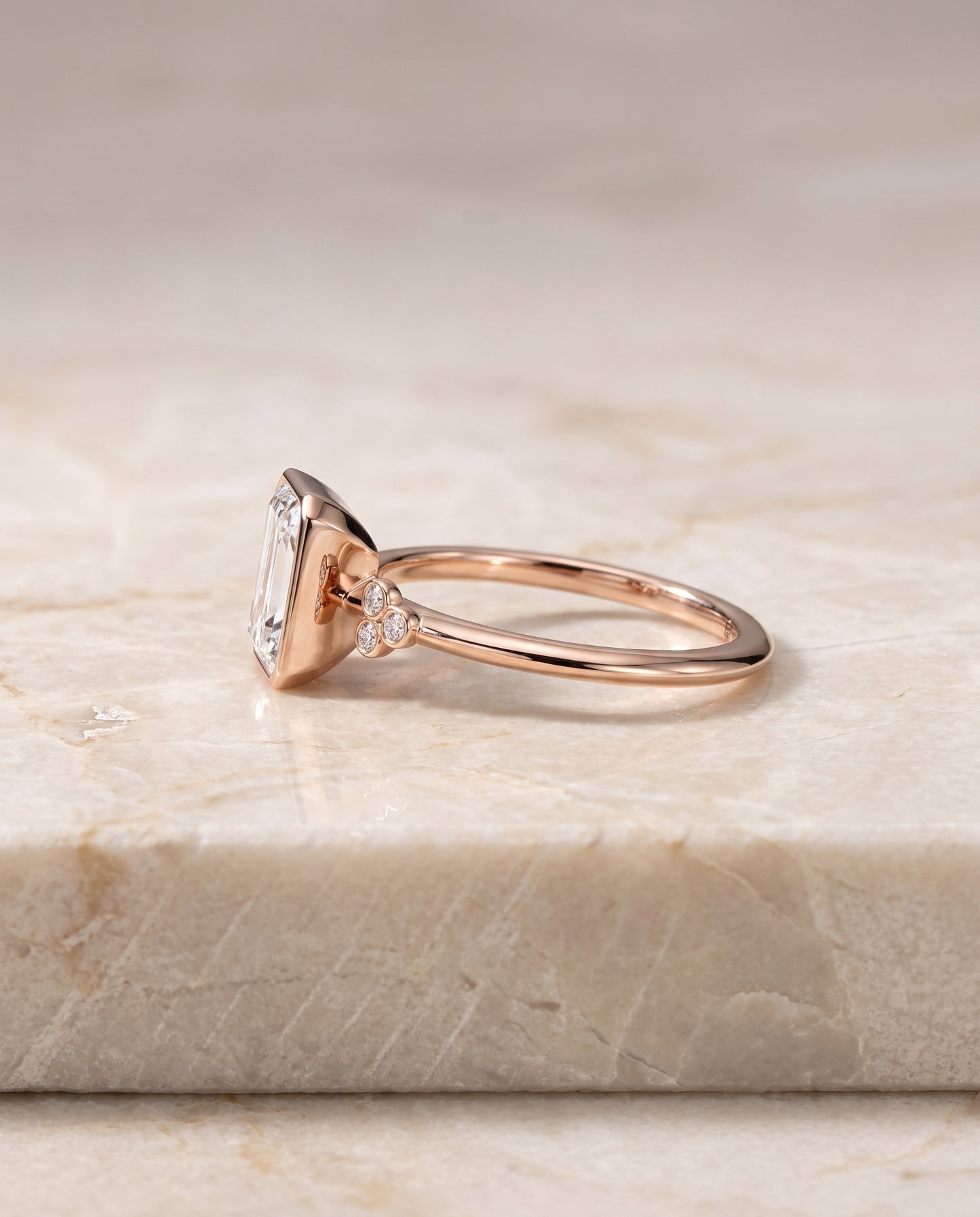 The Selena Clover Bezel Accent Solitaire Radiant Cut Engagement Ring Setting in 14K Rose Gold
