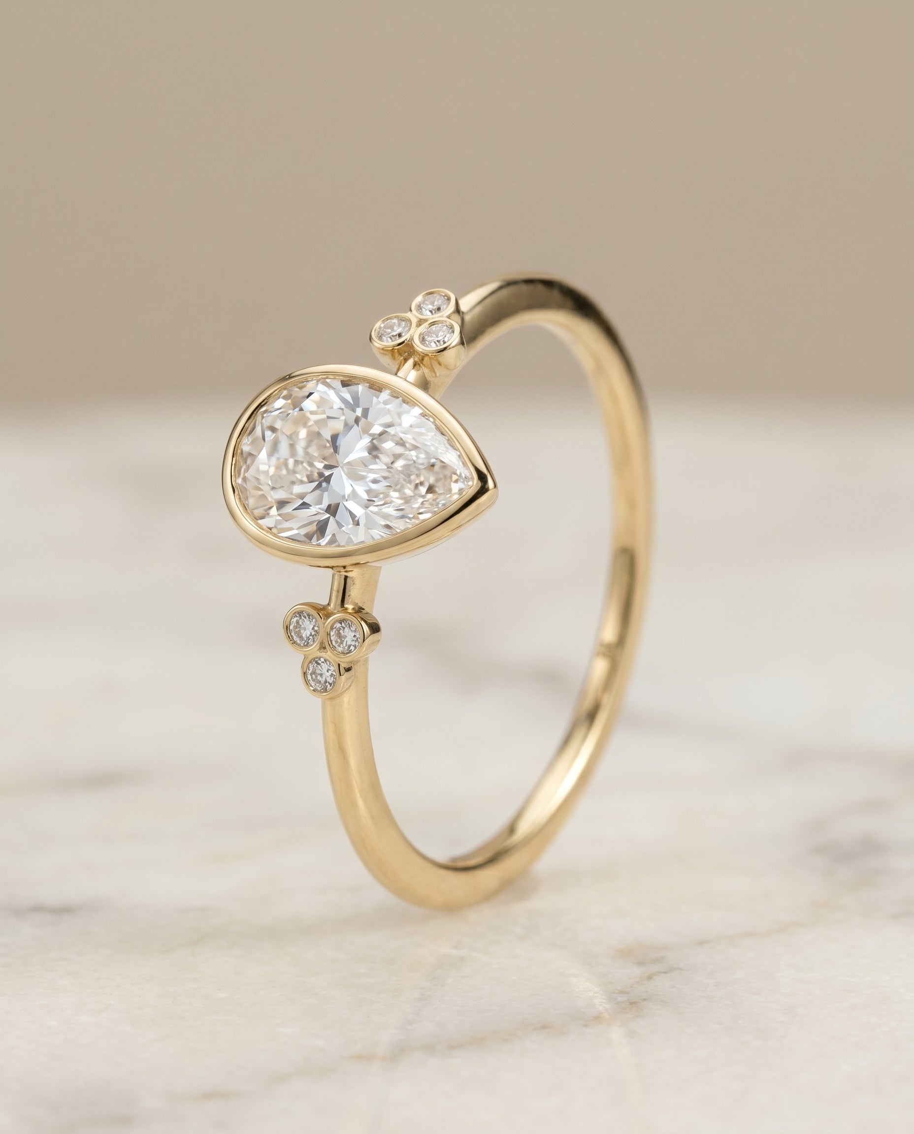 Clover Bezel Accent Solitaire styling on The Selena princess engagement ring setting | RockHer